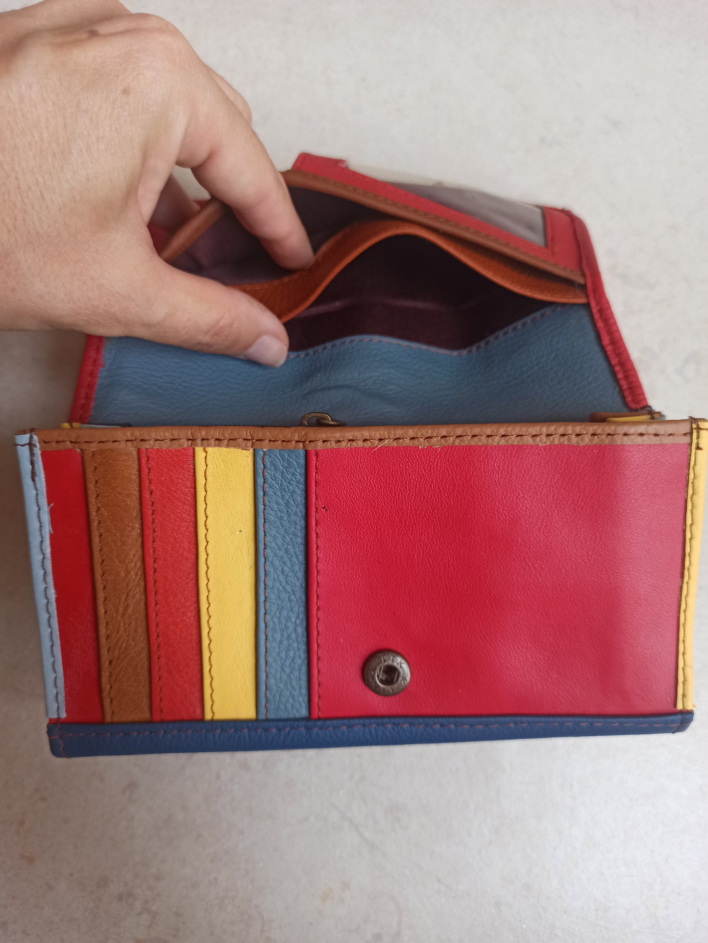 Red and blue leather wallet