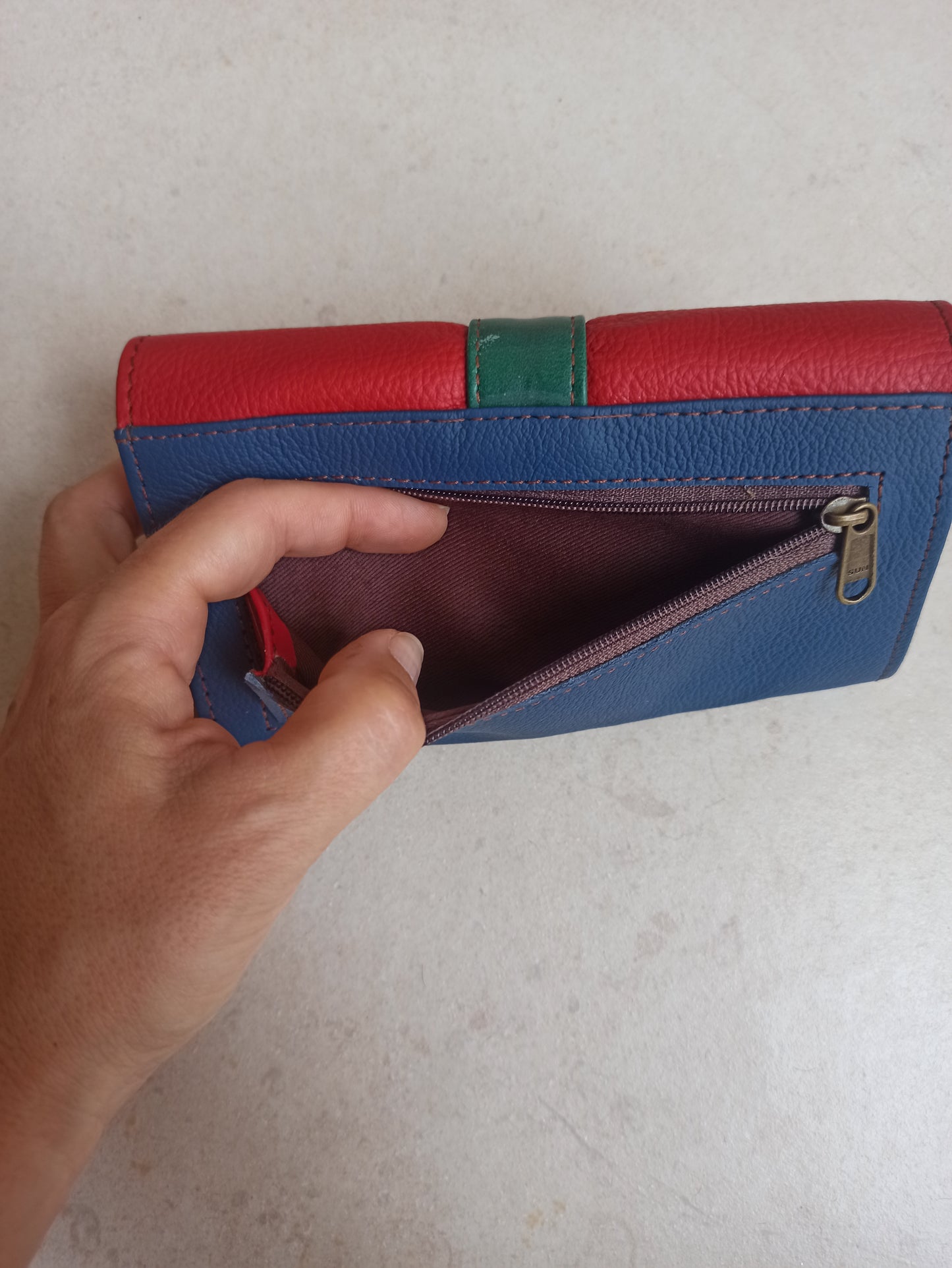 Red and blue leather wallet