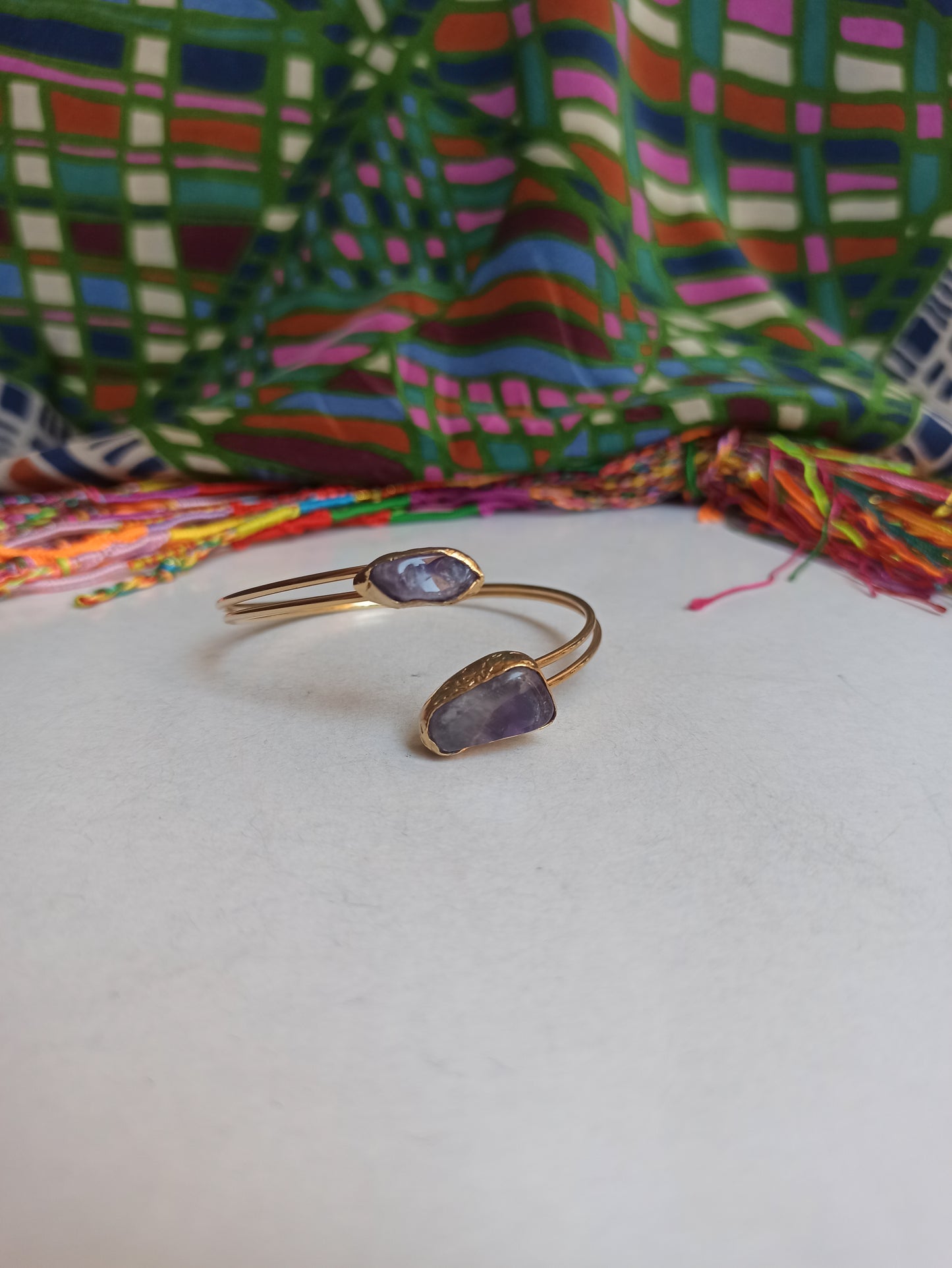 Golden bracelet with two amethyst chips