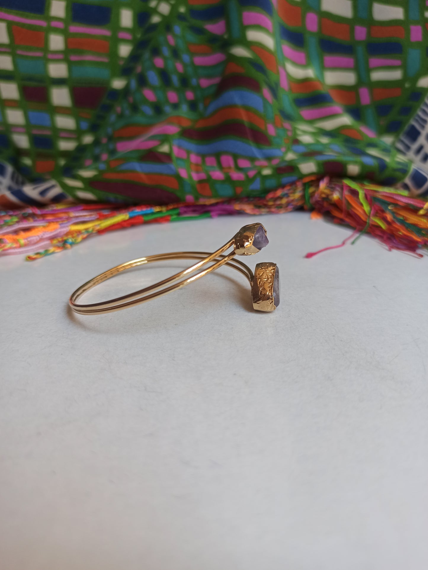 Golden bracelet with two amethyst chips