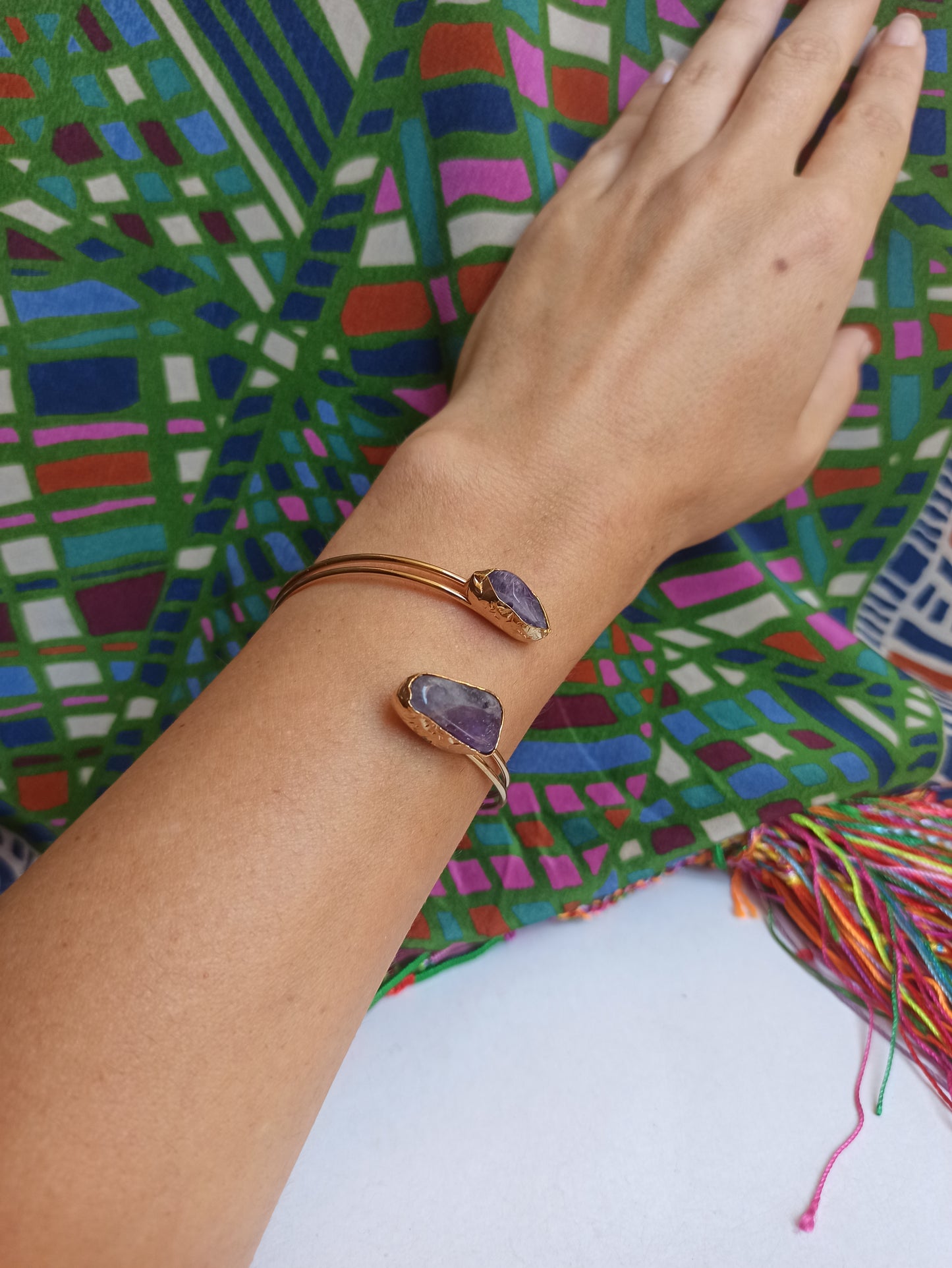 Golden bracelet with two amethyst chips