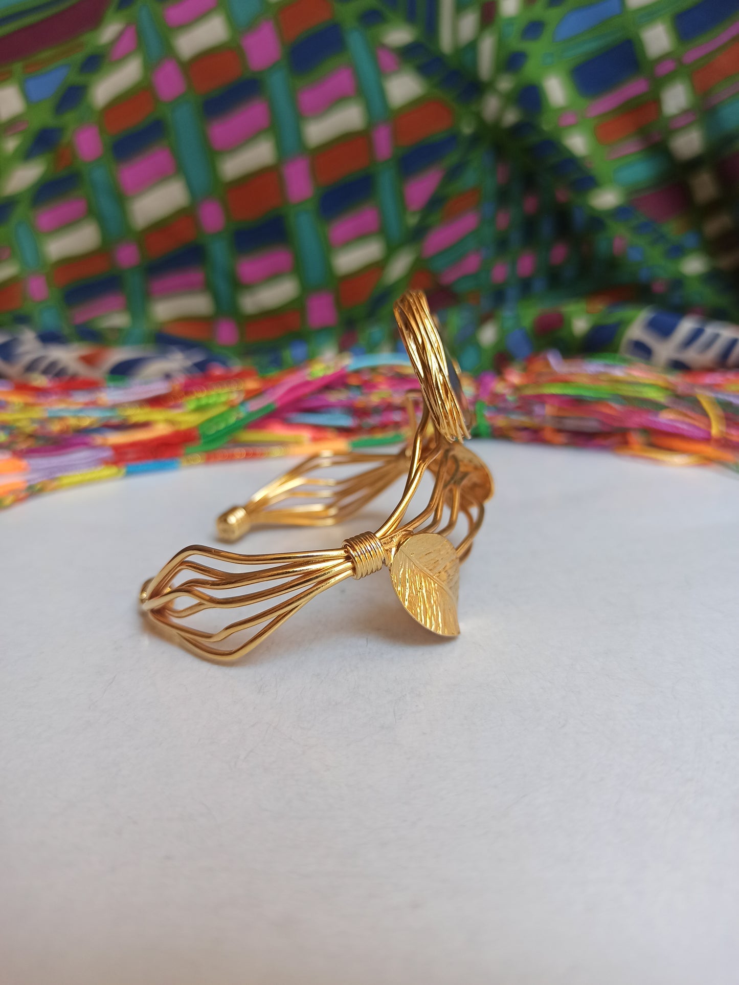 Golden bracelet with light lilac agate leaves