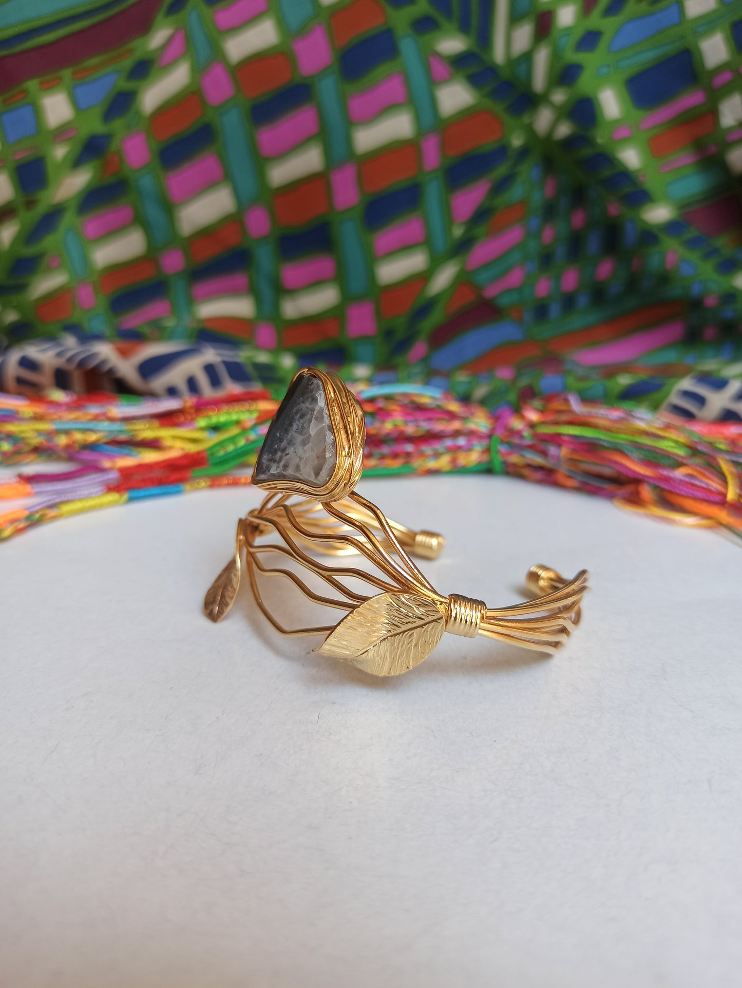 Golden bracelet with gray agate leaves