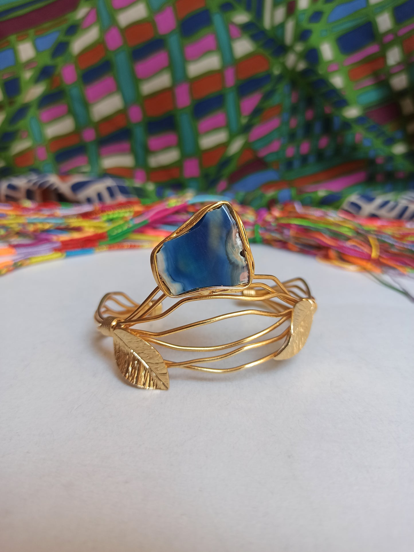 Golden bracelet with blue agate leaves