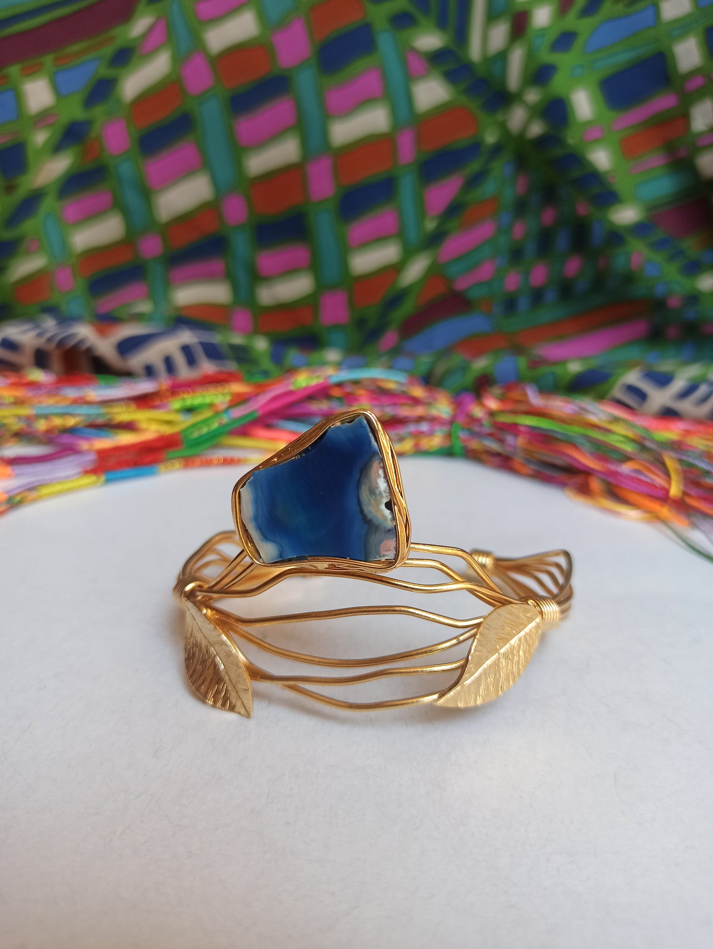 Golden bracelet with blue agate leaves