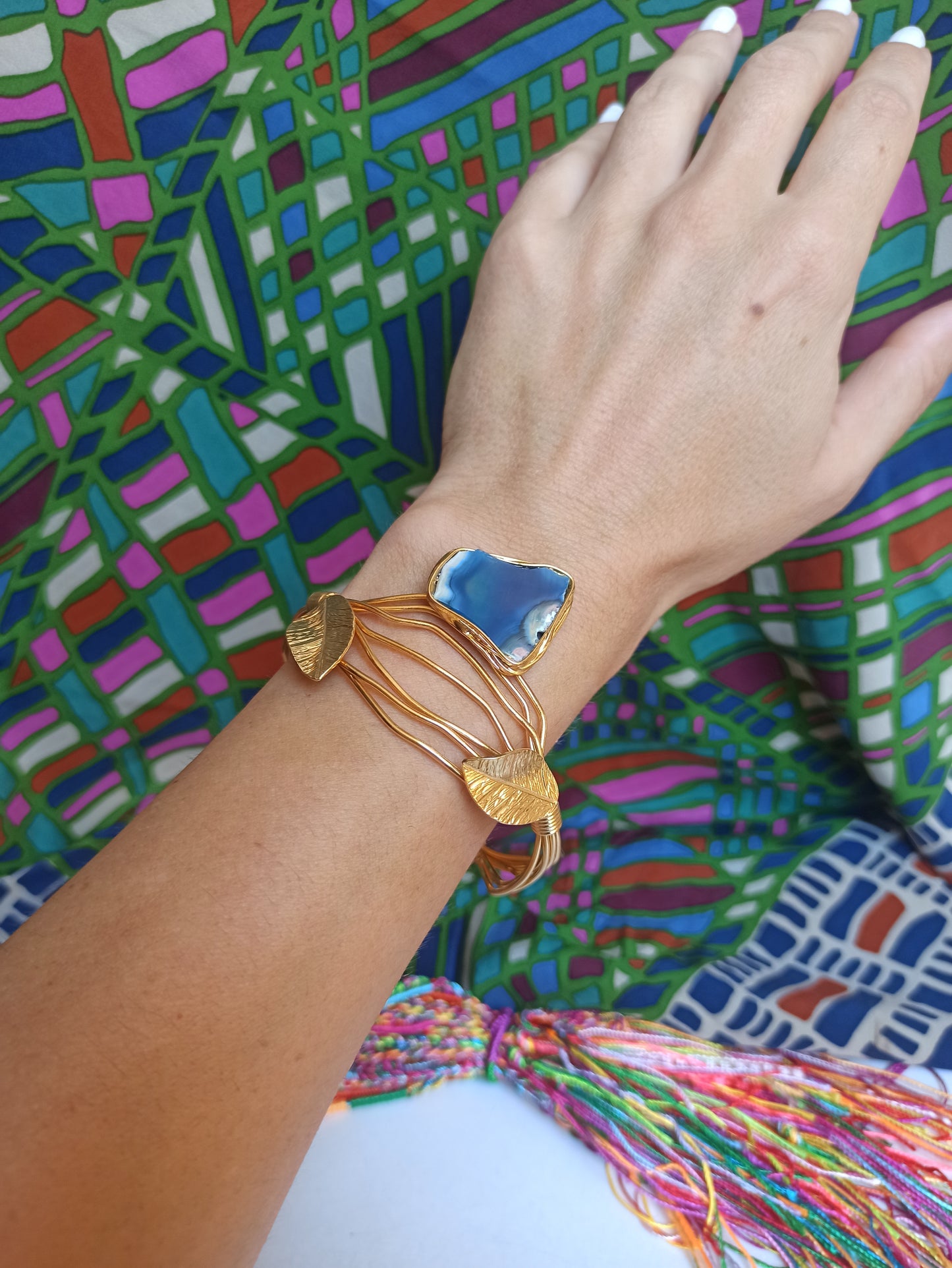 Golden bracelet with blue agate leaves