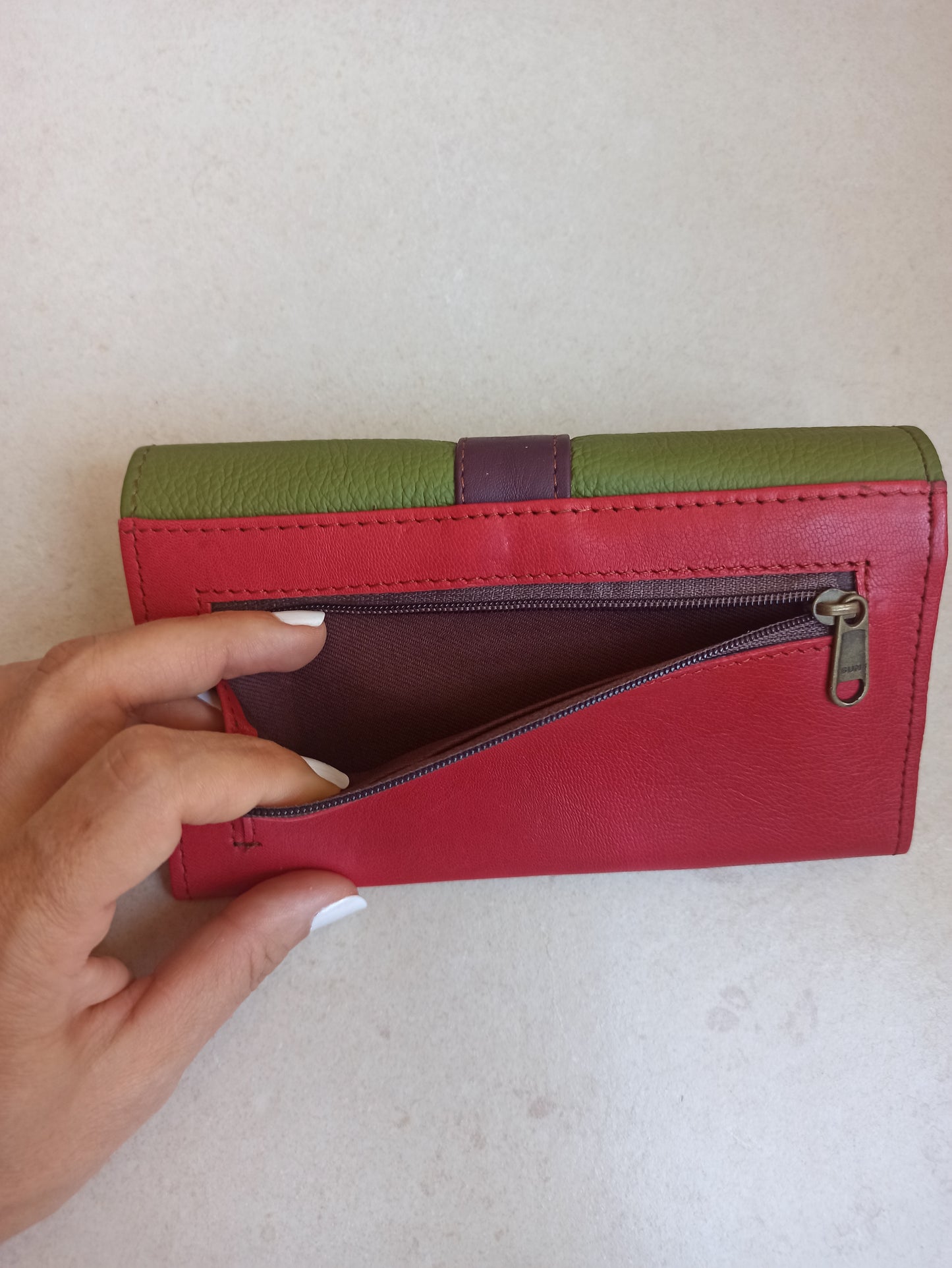 Green and red leather wallet