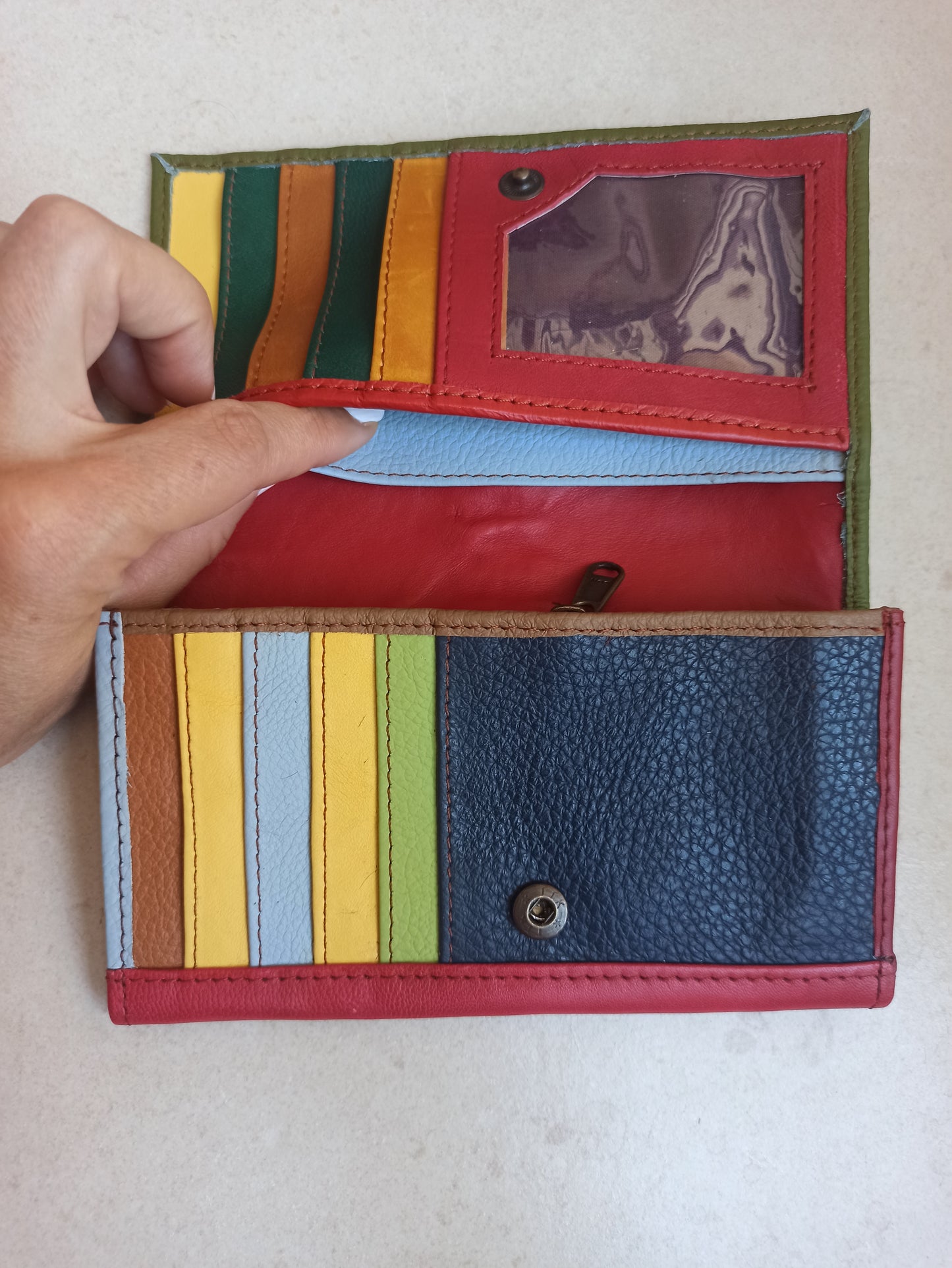 Green and red leather wallet