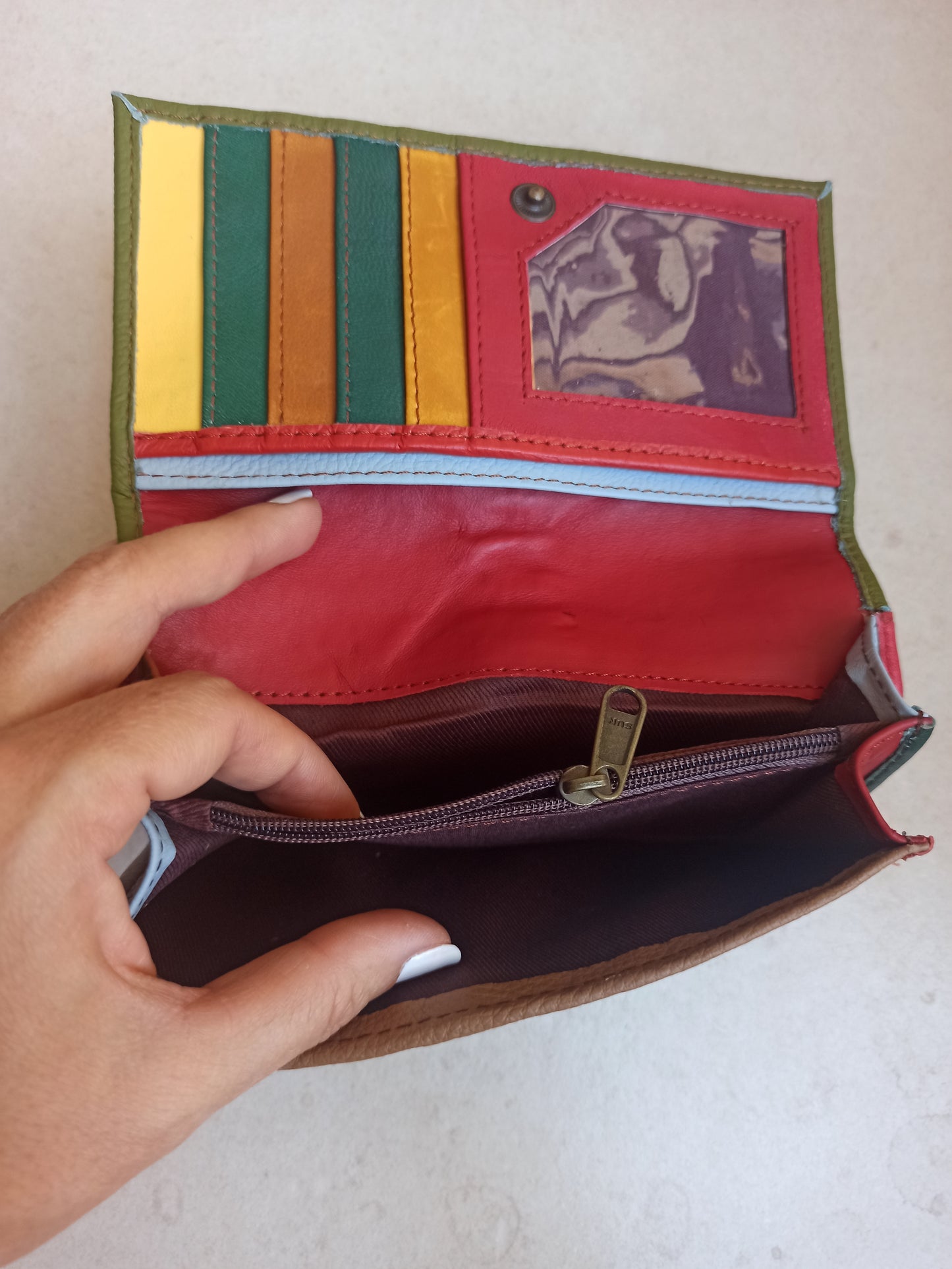 Green and red leather wallet