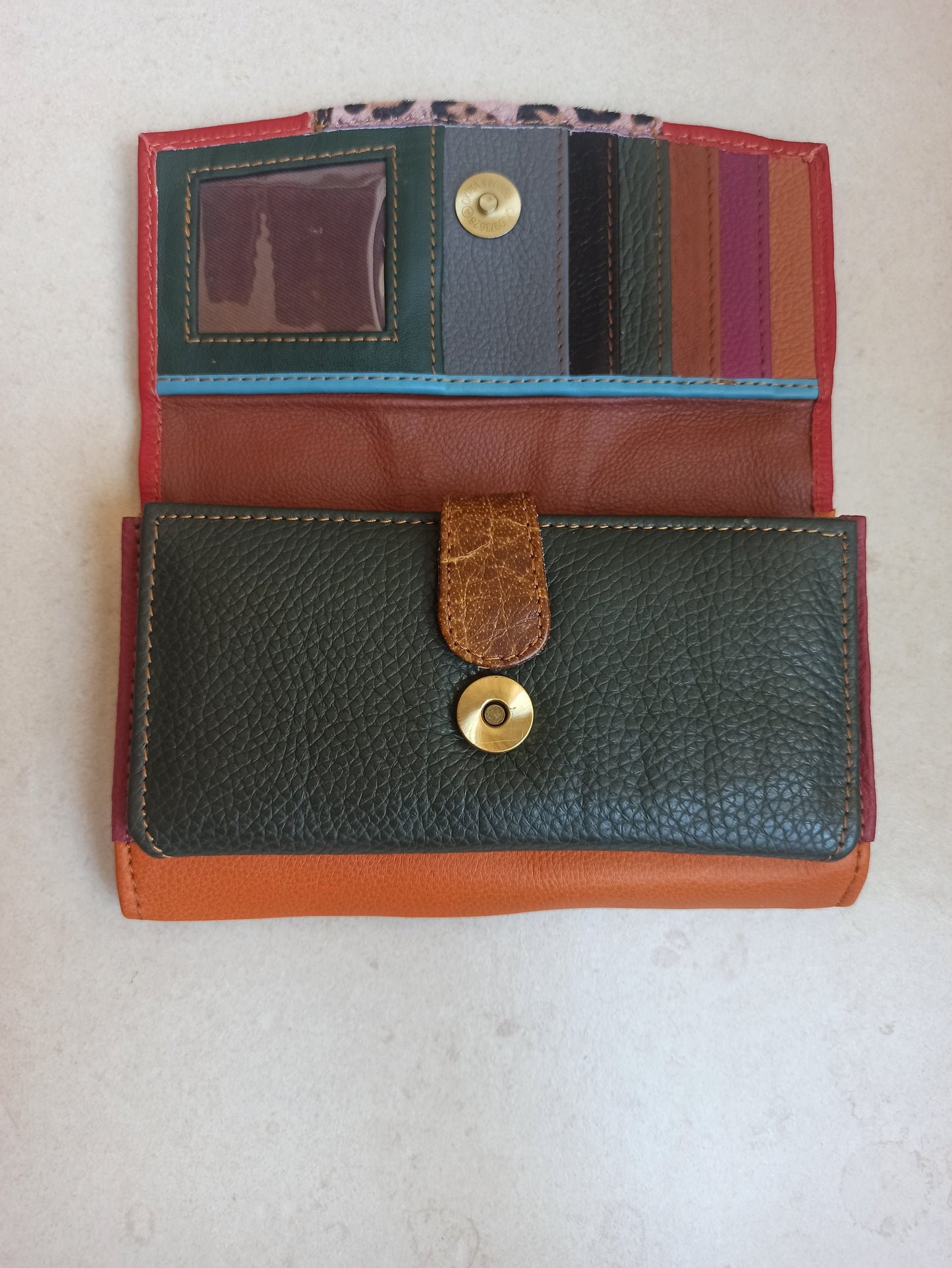 Spotted leather wallet