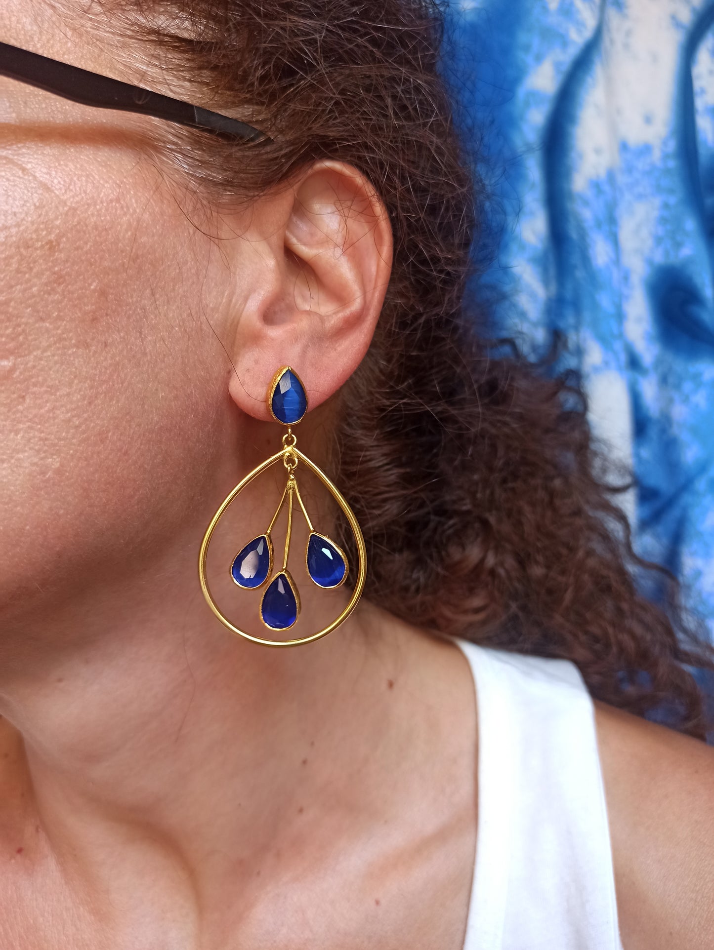 Three blue stone drop earrings