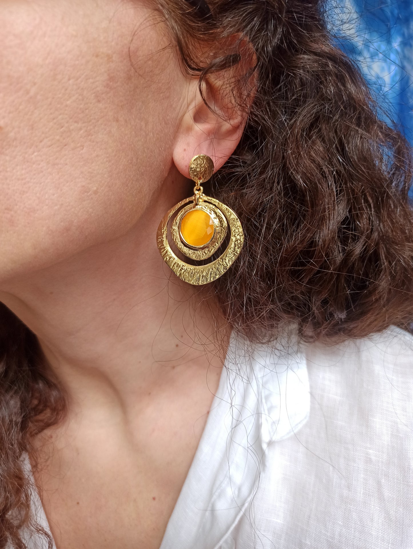 Yellow golden earrings