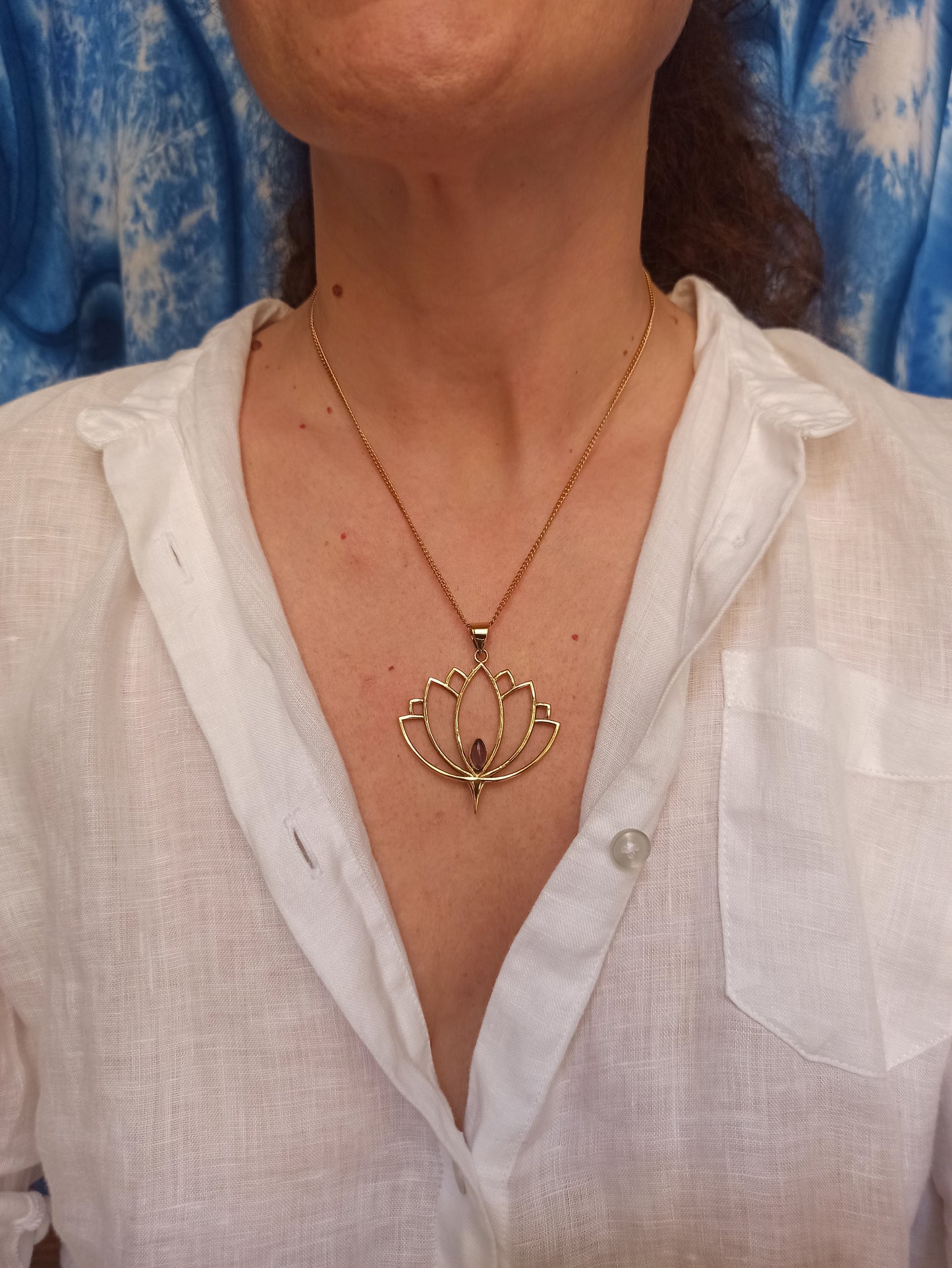 Golden necklace with amethyst lotus flower pendant