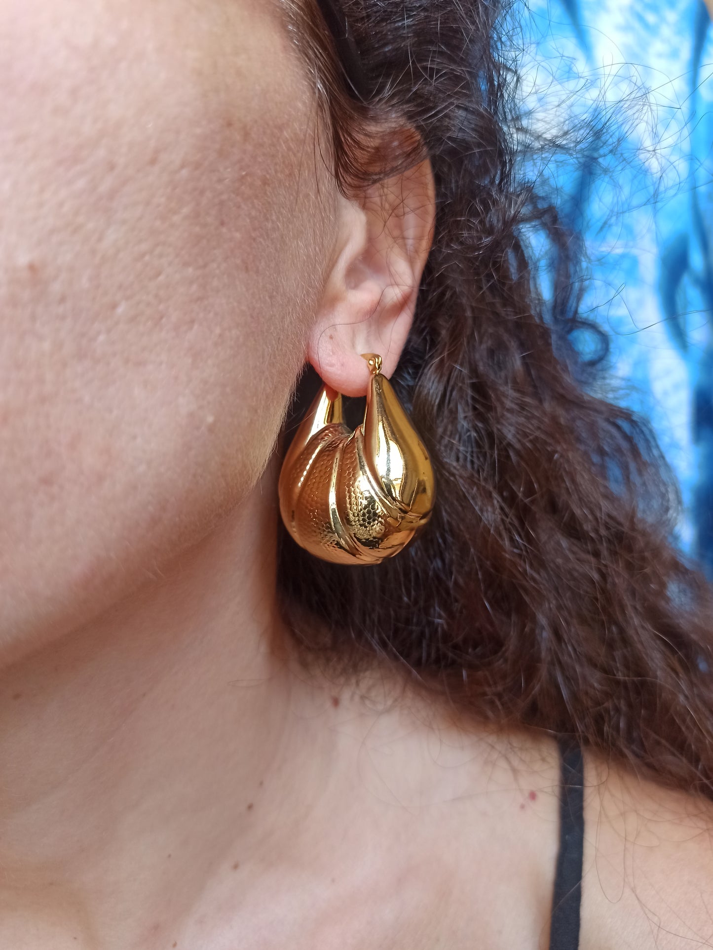 Domed gold steel earrings