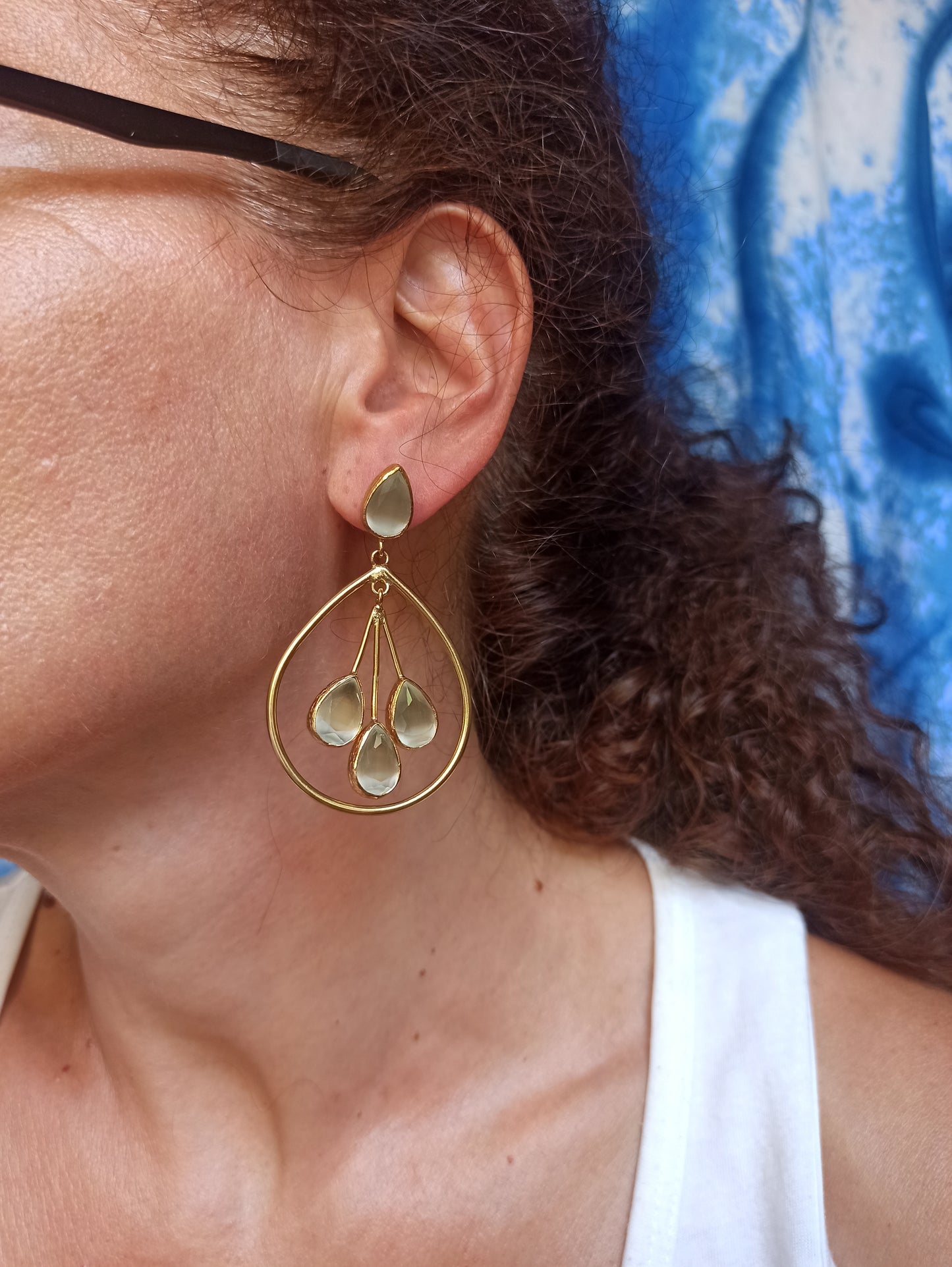 Three-stone white drop earrings