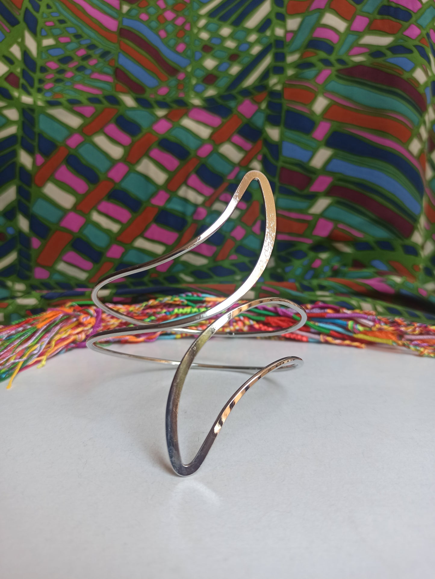 Double pointed silver arm bracelet