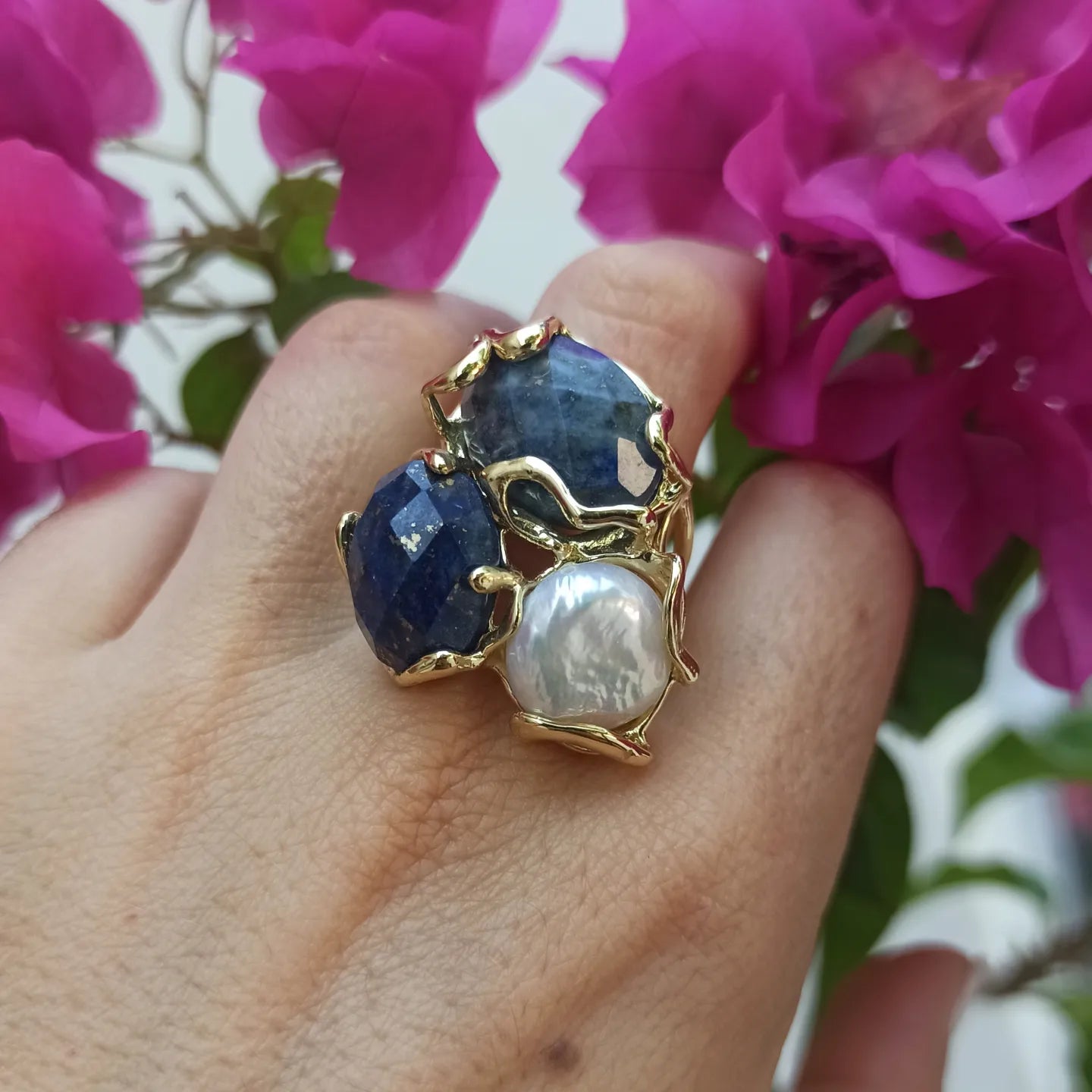 Golden ring with 3 blue stones and freshwater pearl