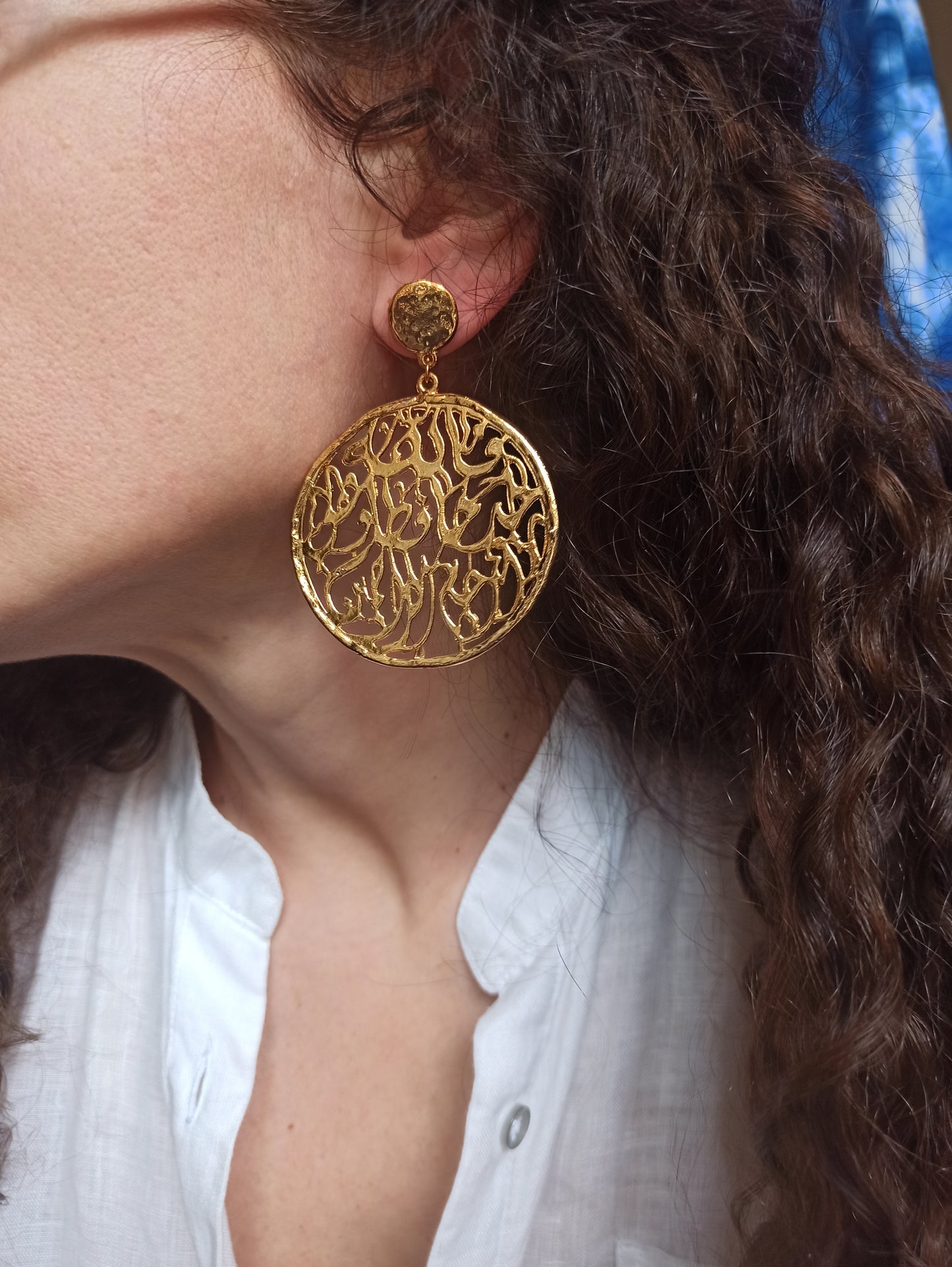 Golden pierced circle earrings