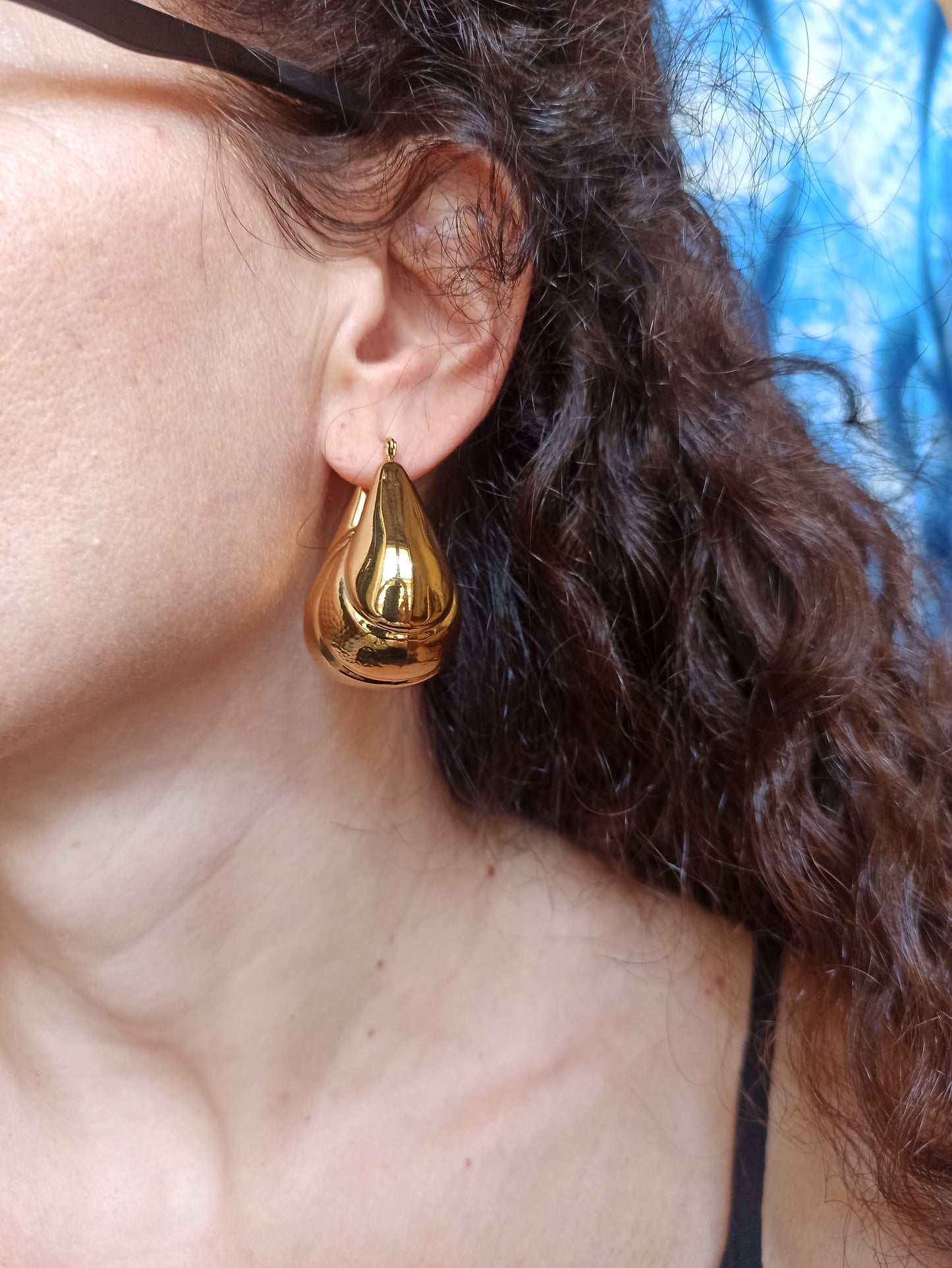 Domed gold steel earrings