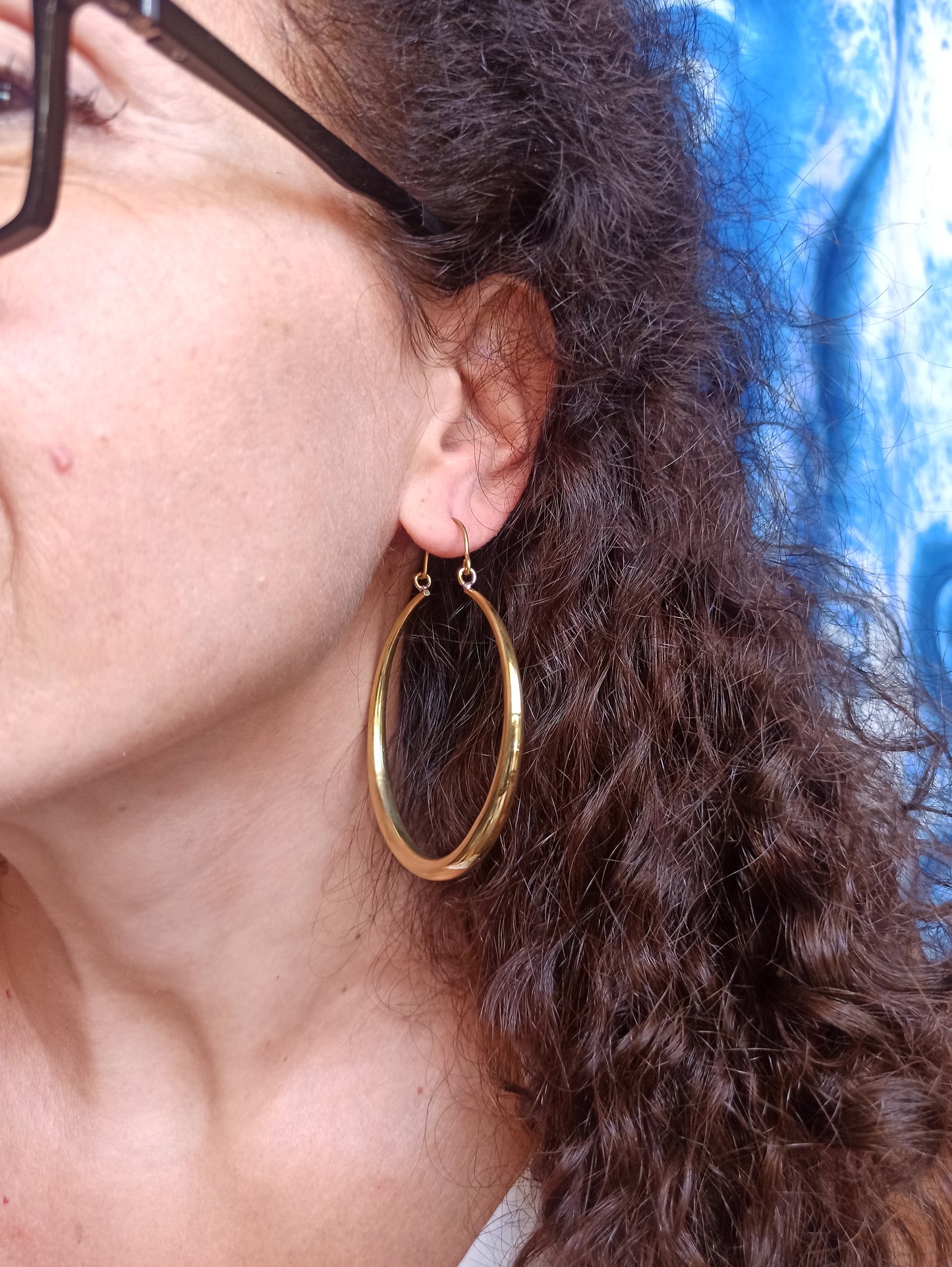 Golden boho earrings with large smooth circles