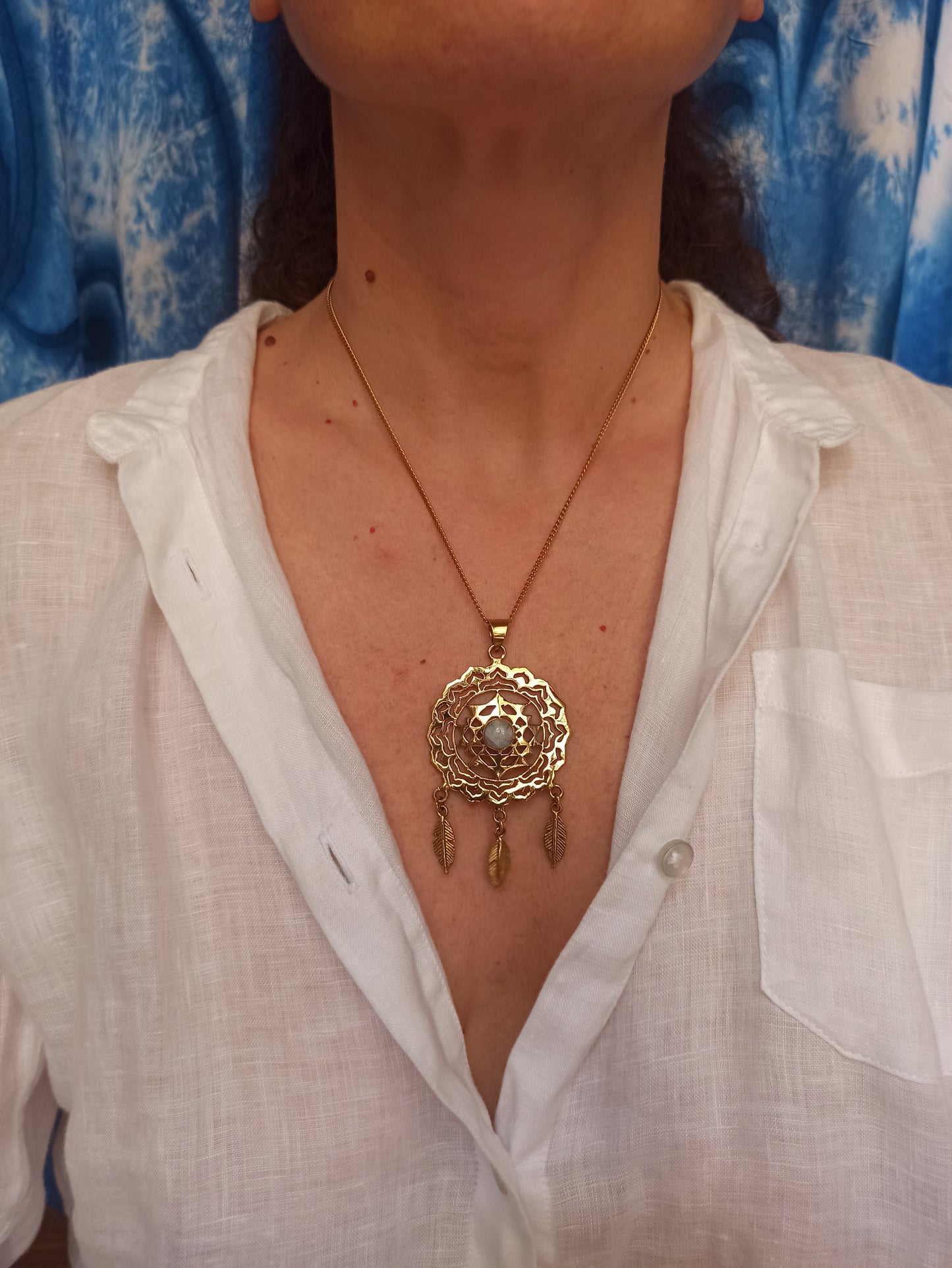 Golden necklace with moonstone pendant