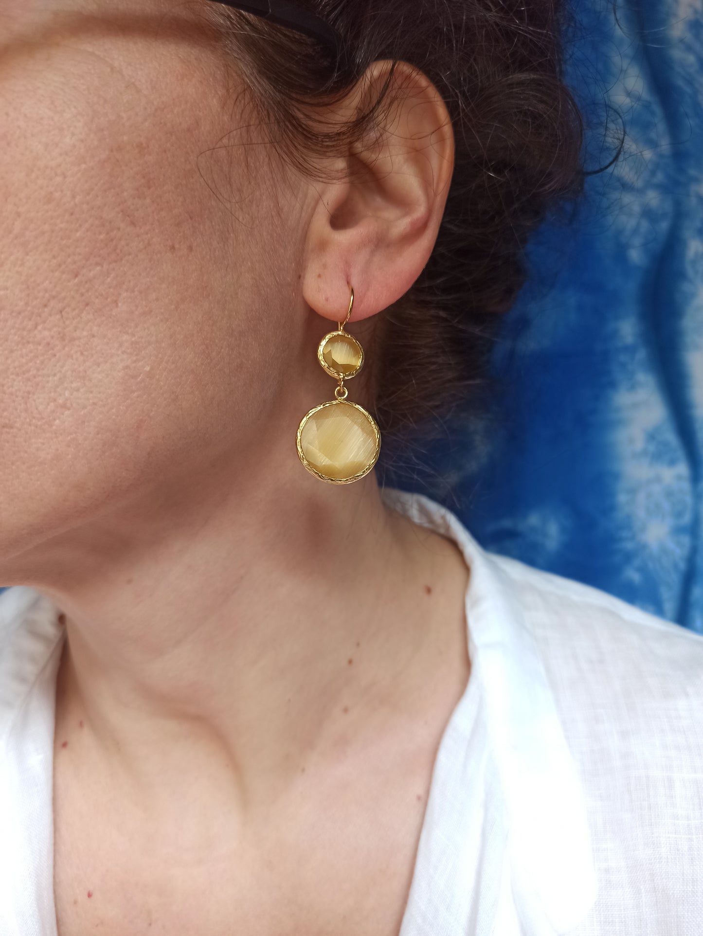2 light yellow stone earrings