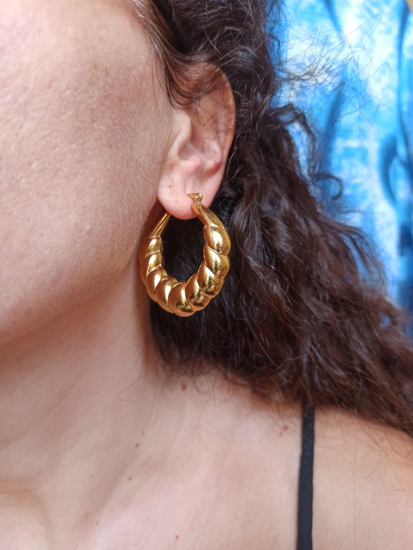 Gold plated steel earrings braided