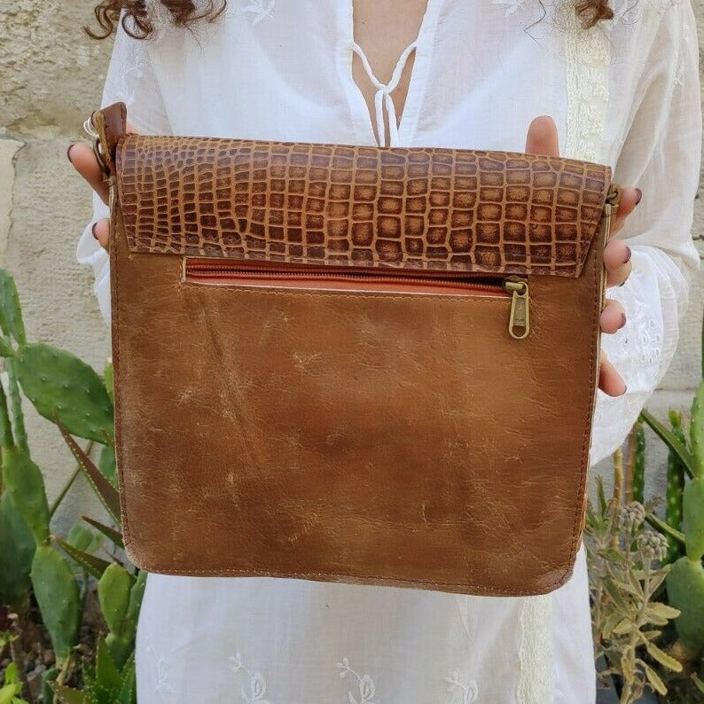 Leather shoulder bag with lace flap