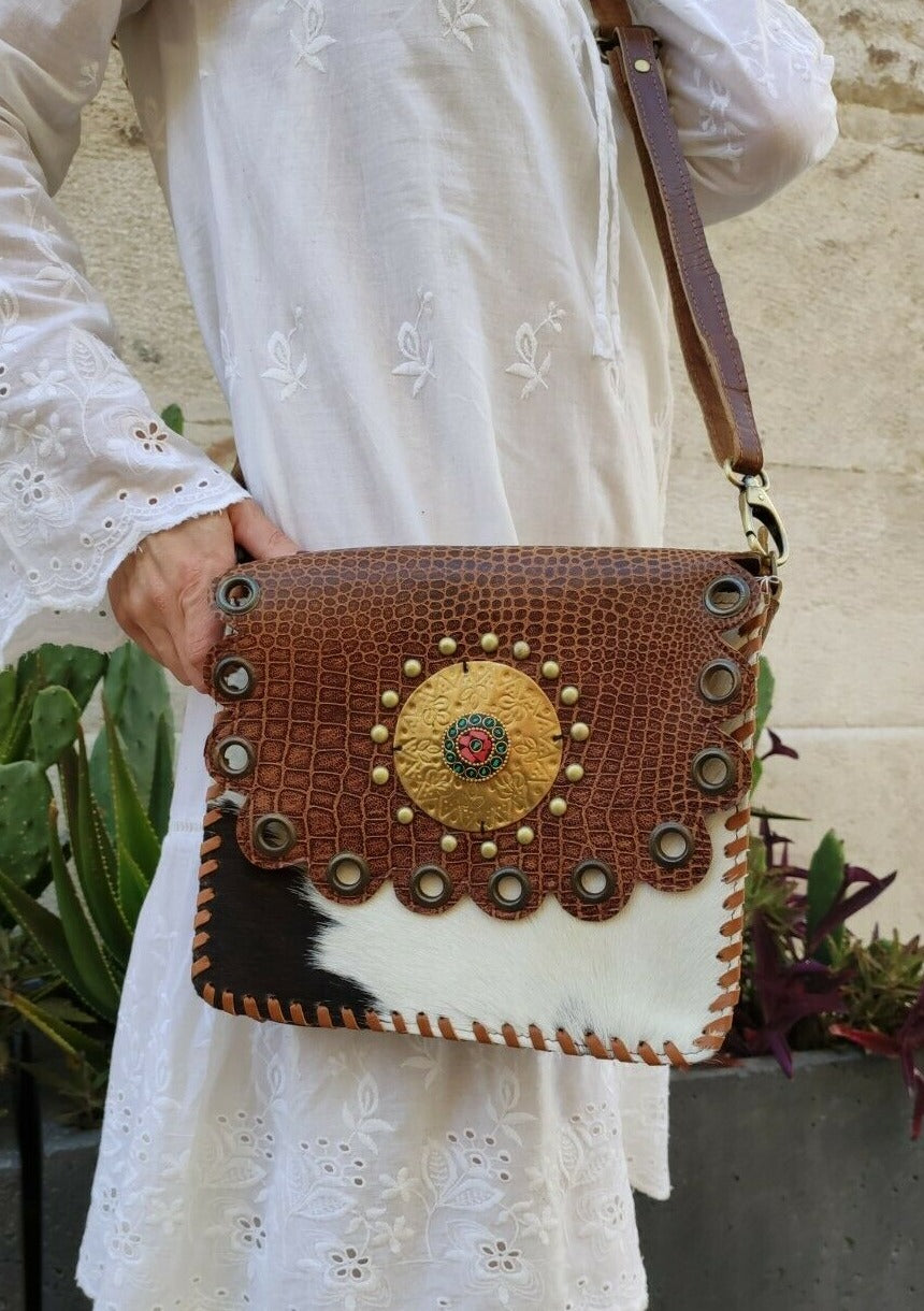 Leather shoulder bag with lace flap