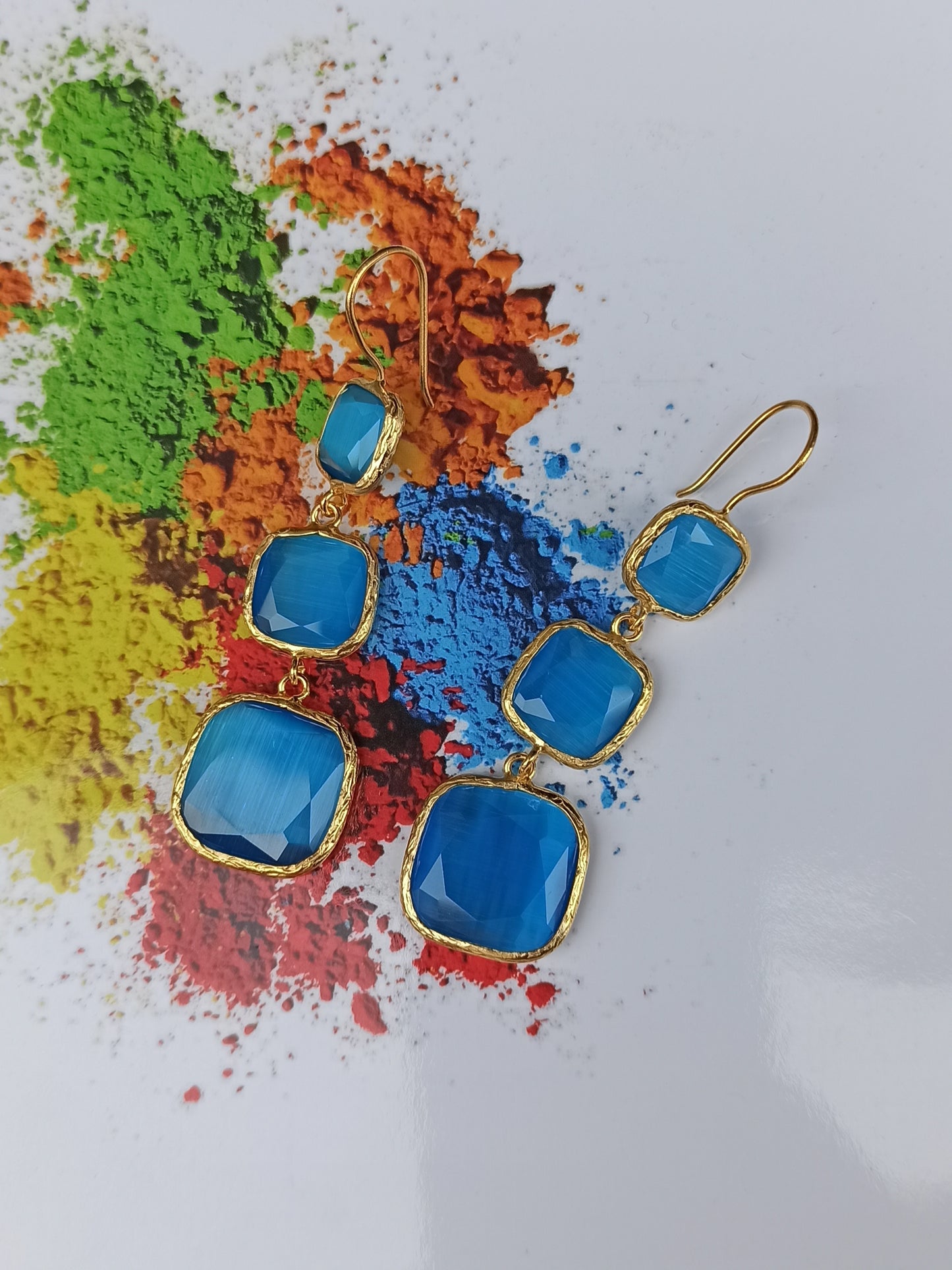 3 blue stone earrings