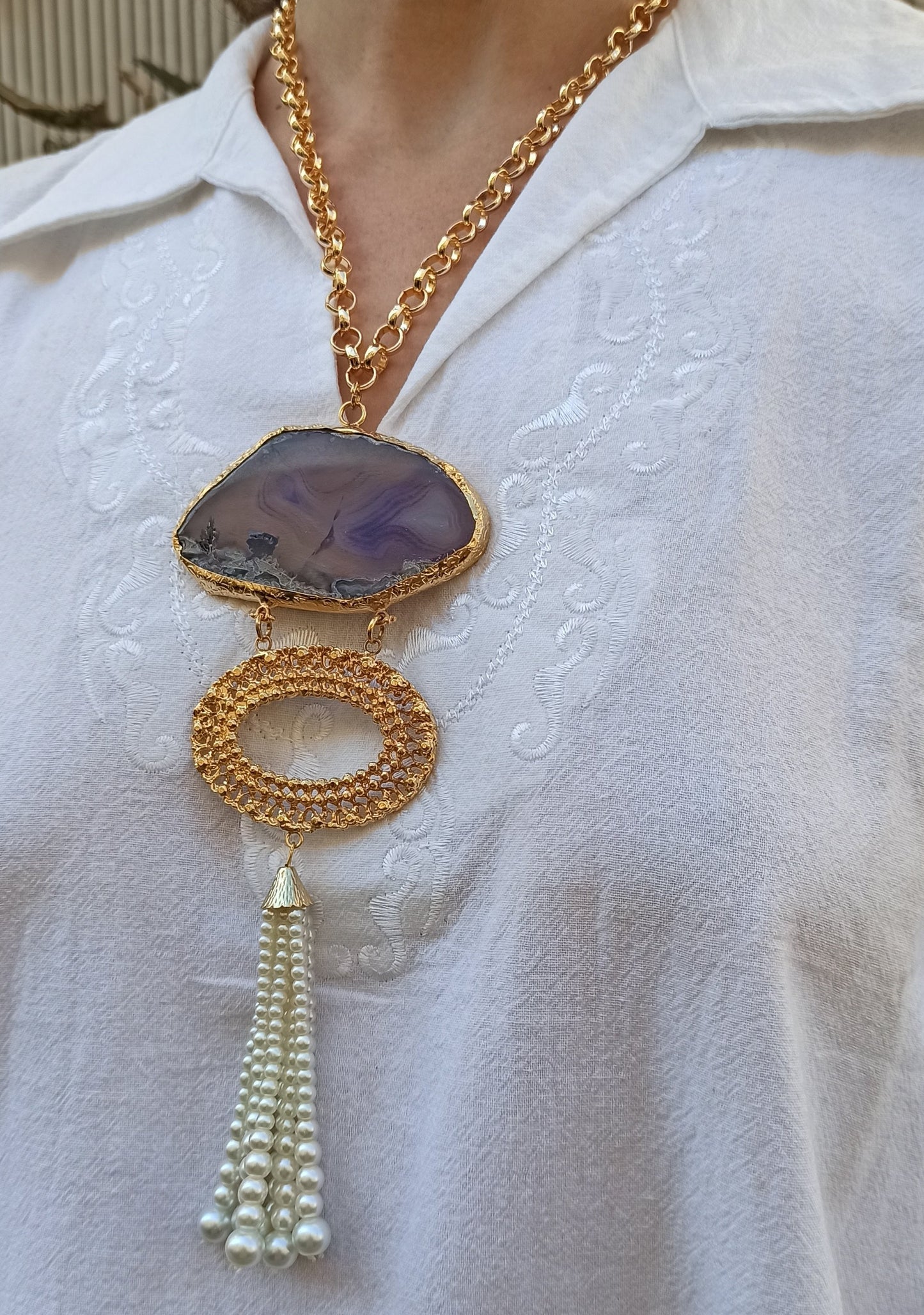 Pendant necklace with purple agate and beads