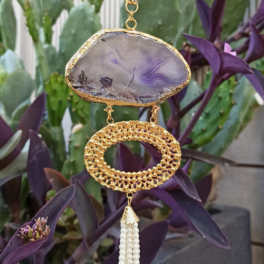 Pendant necklace with purple agate and beads