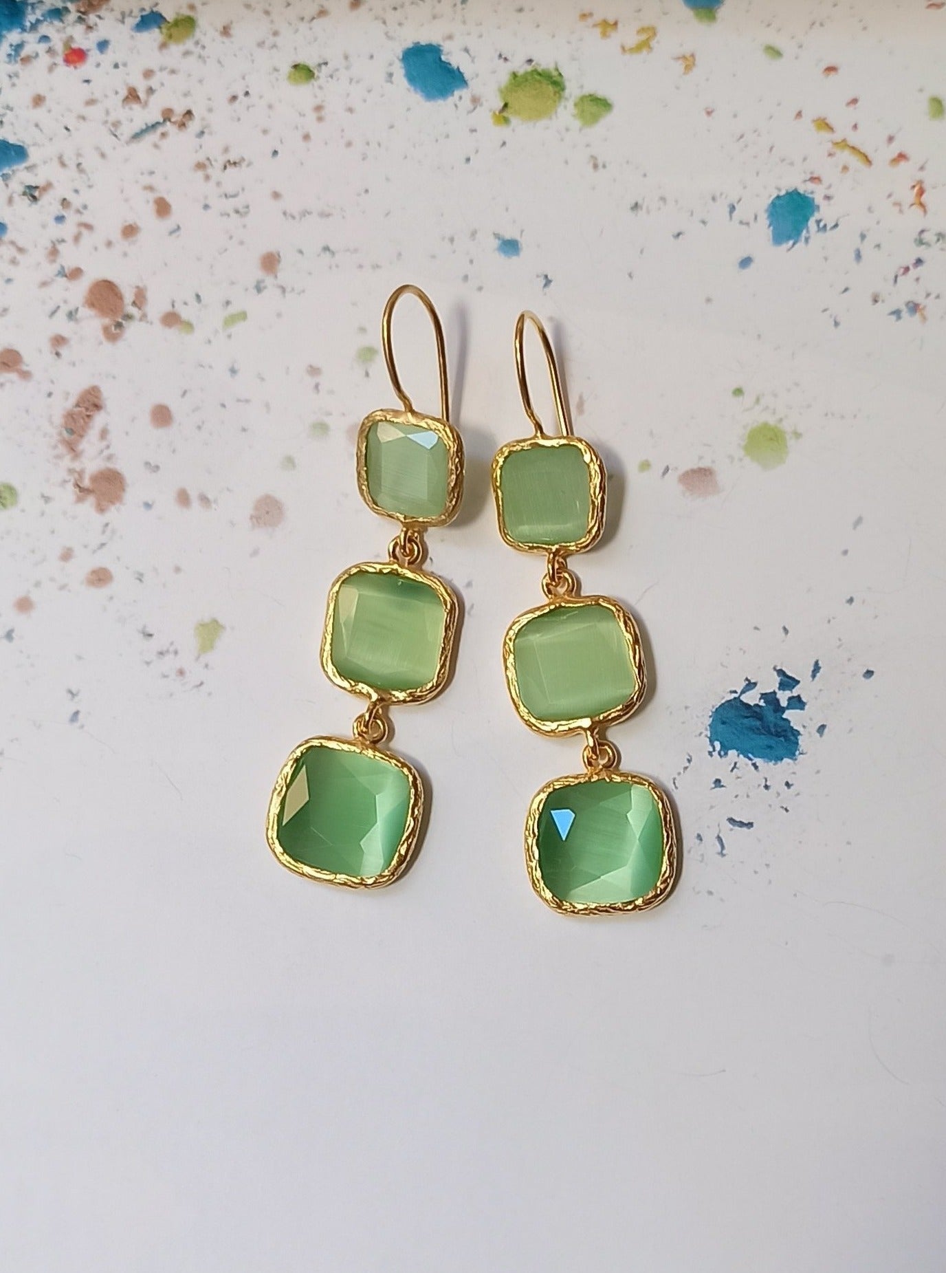 3 light green stone earrings