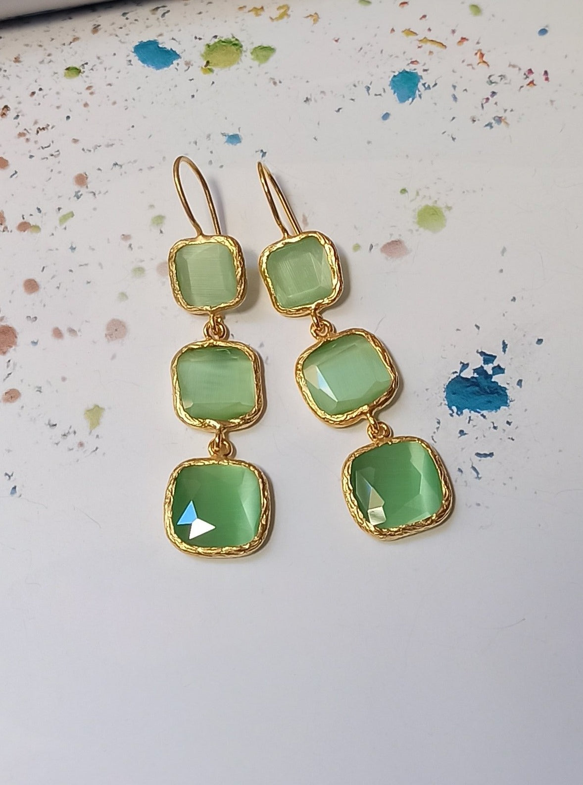 3 light green stone earrings