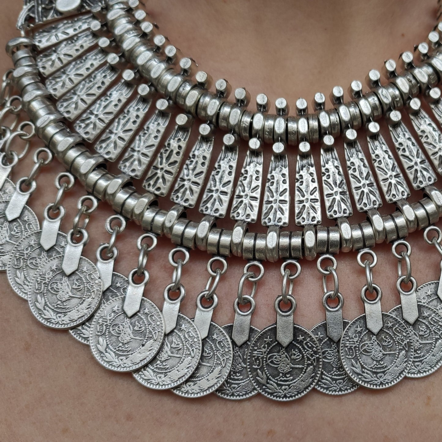 Zamak coin level 1 bib necklace