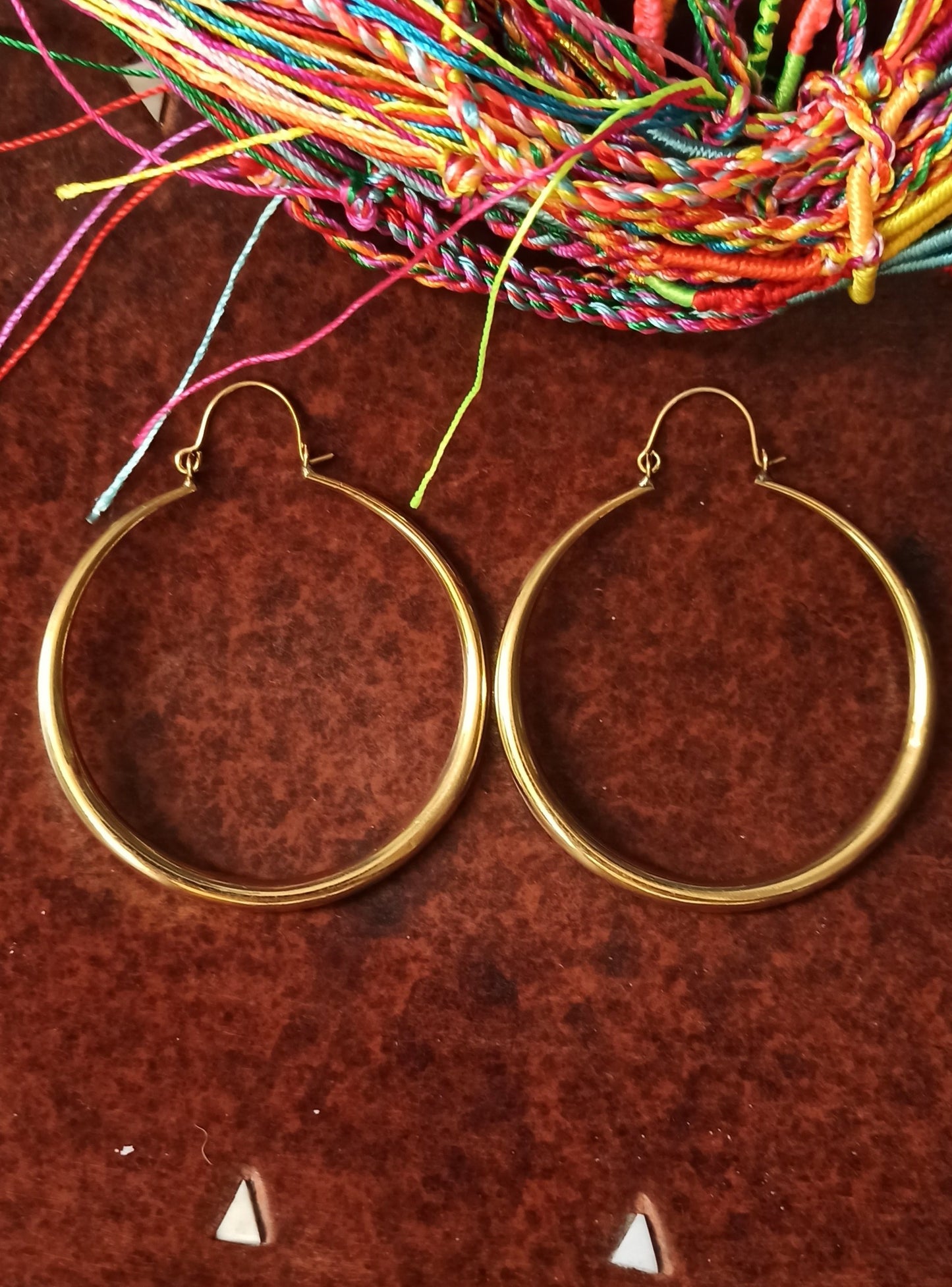 Golden boho earrings with large smooth circles