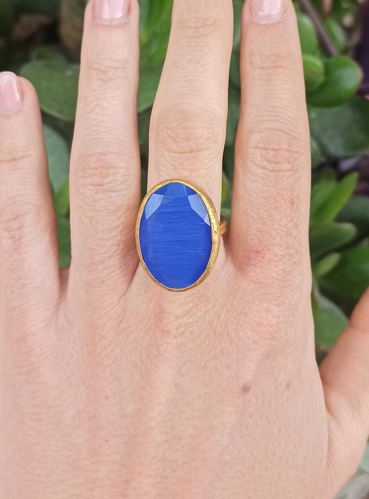 Blue oval golden ring