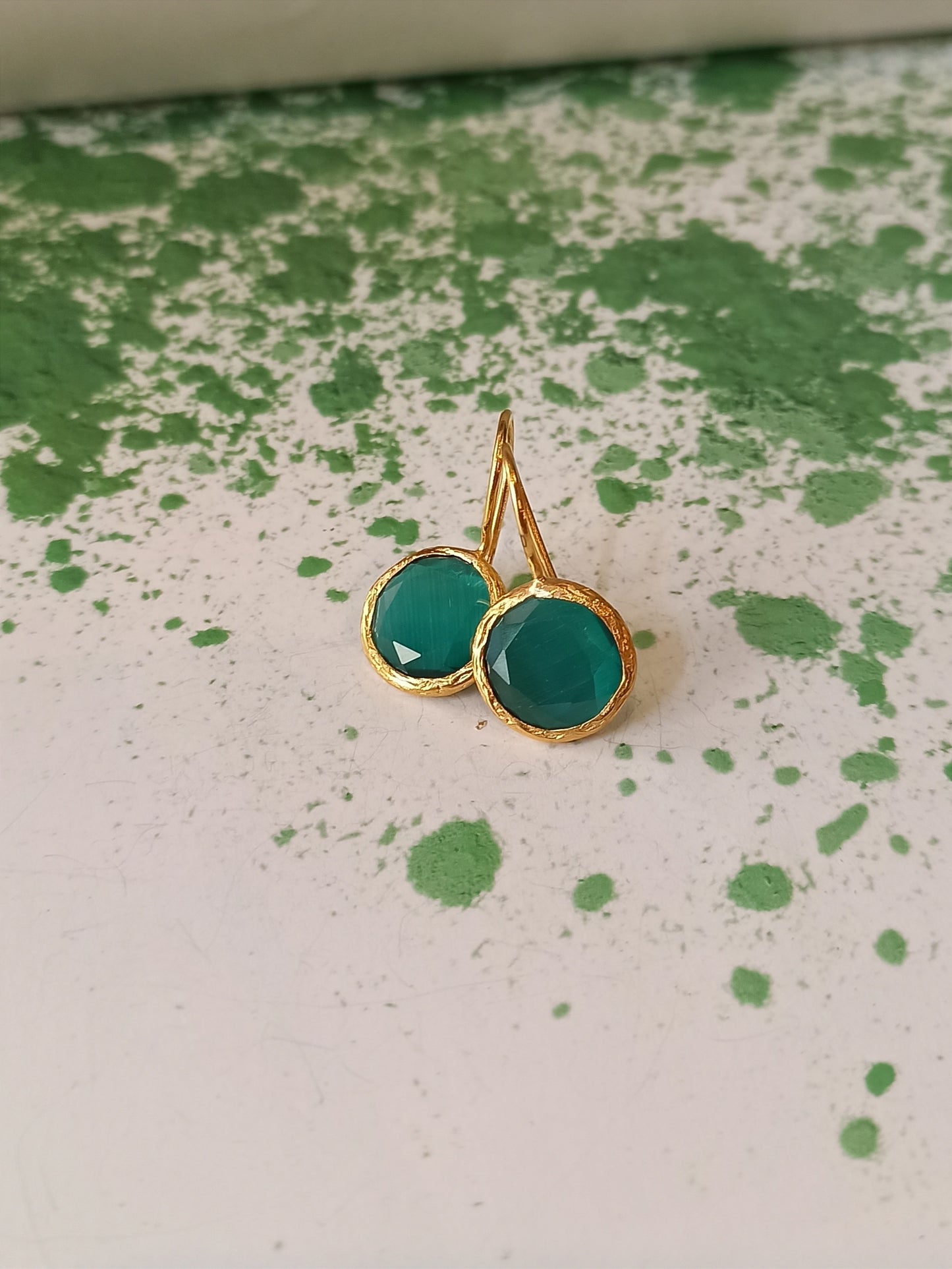 Small bottle green round stone earrings