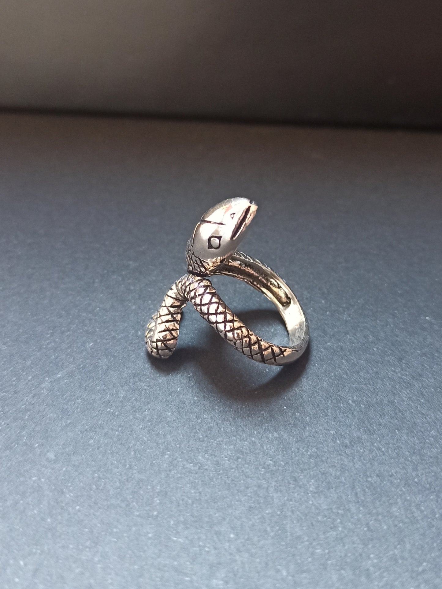 Curled tail silver snake boho ring