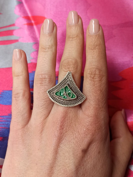 Green triangle ring