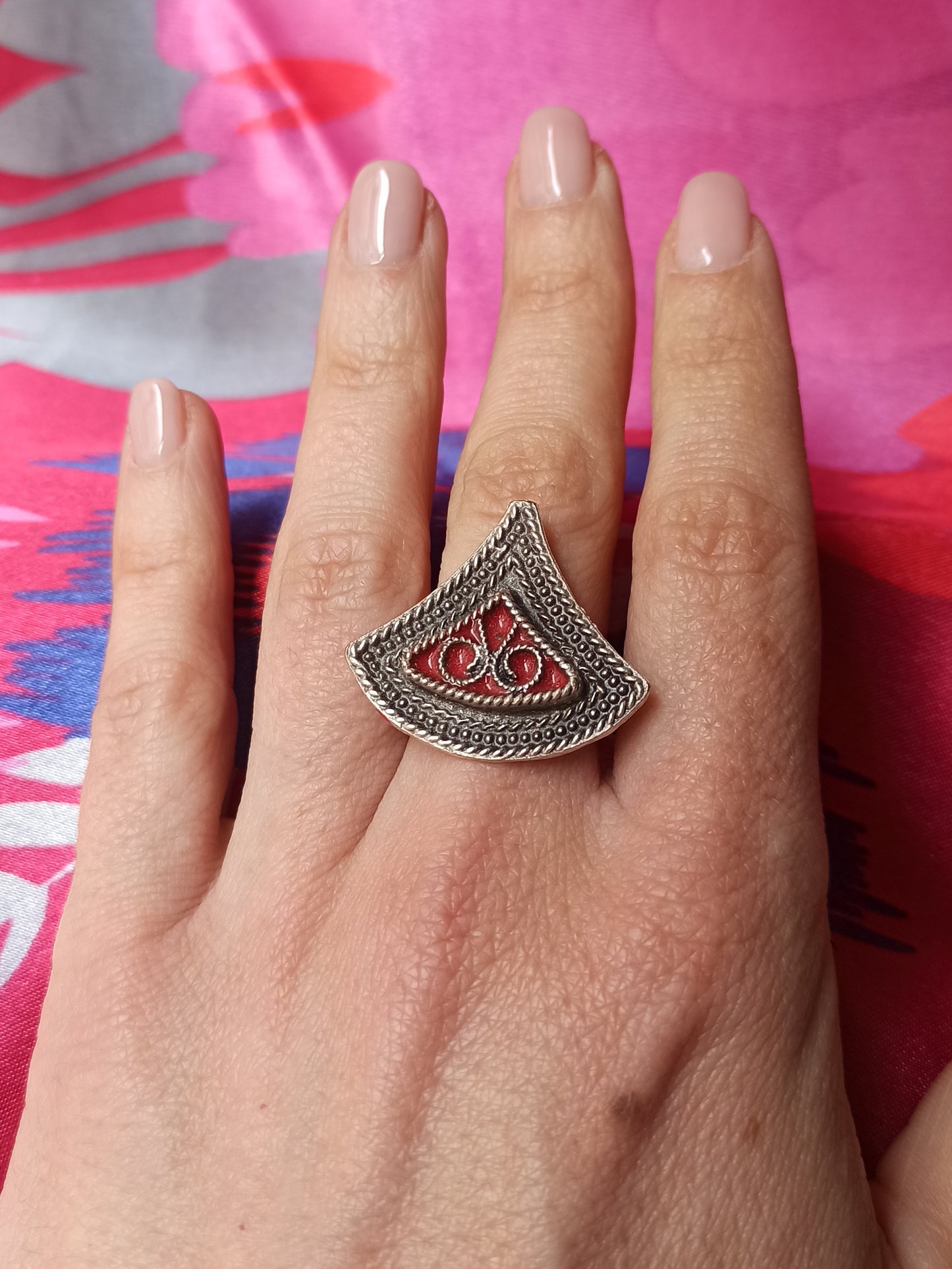 Red triangle ring