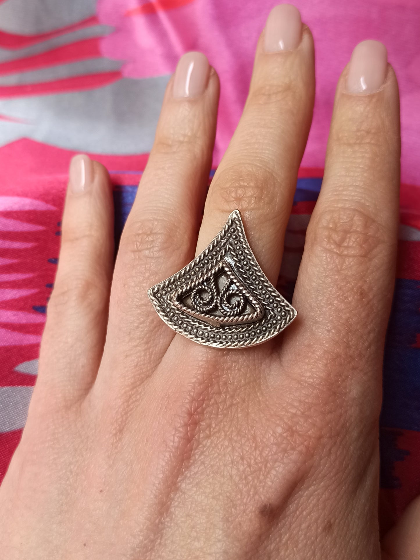 Black triangle ring