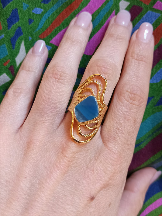 Golden ring with blue agate band