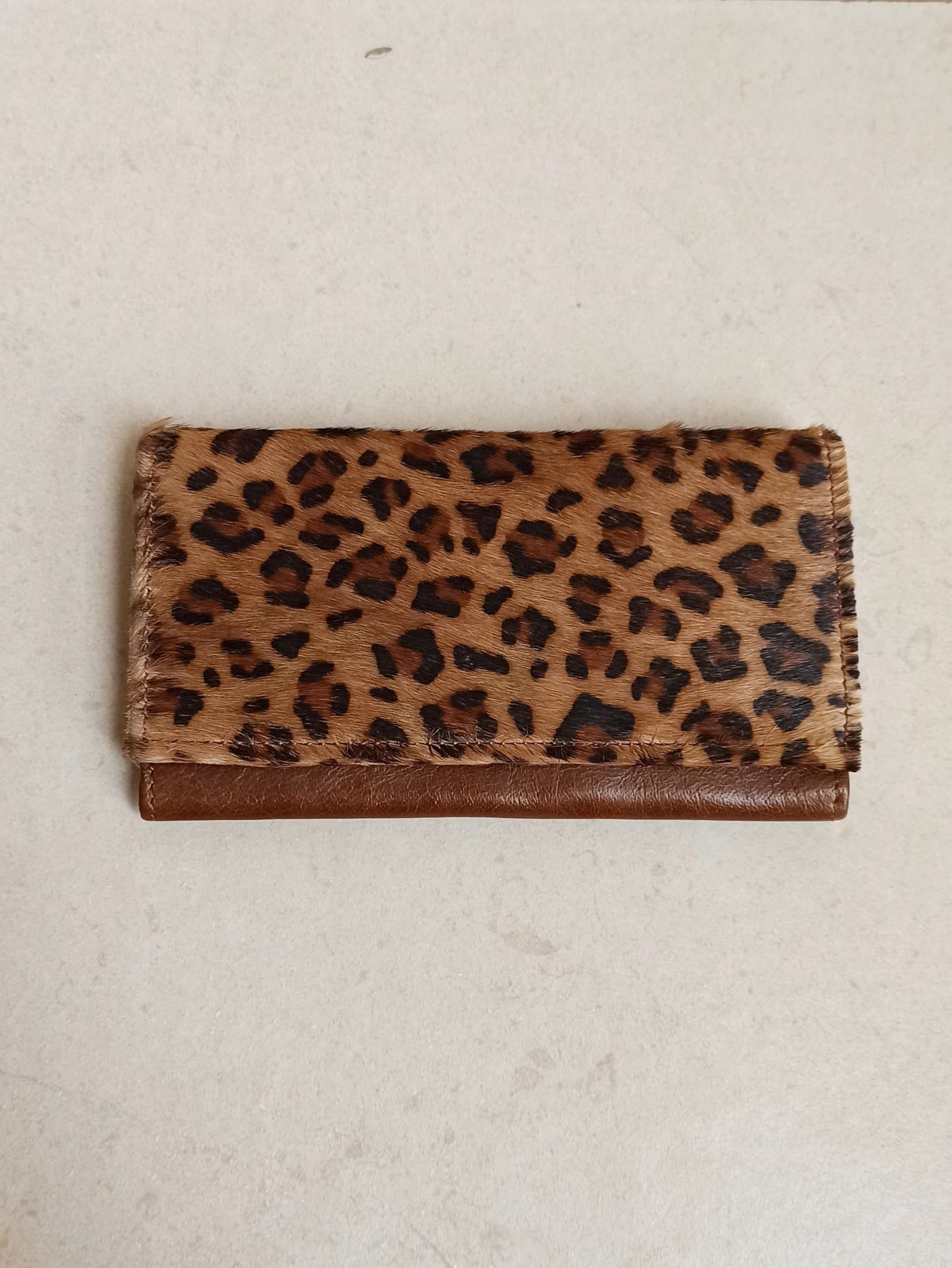 Brown spotted leather wallet