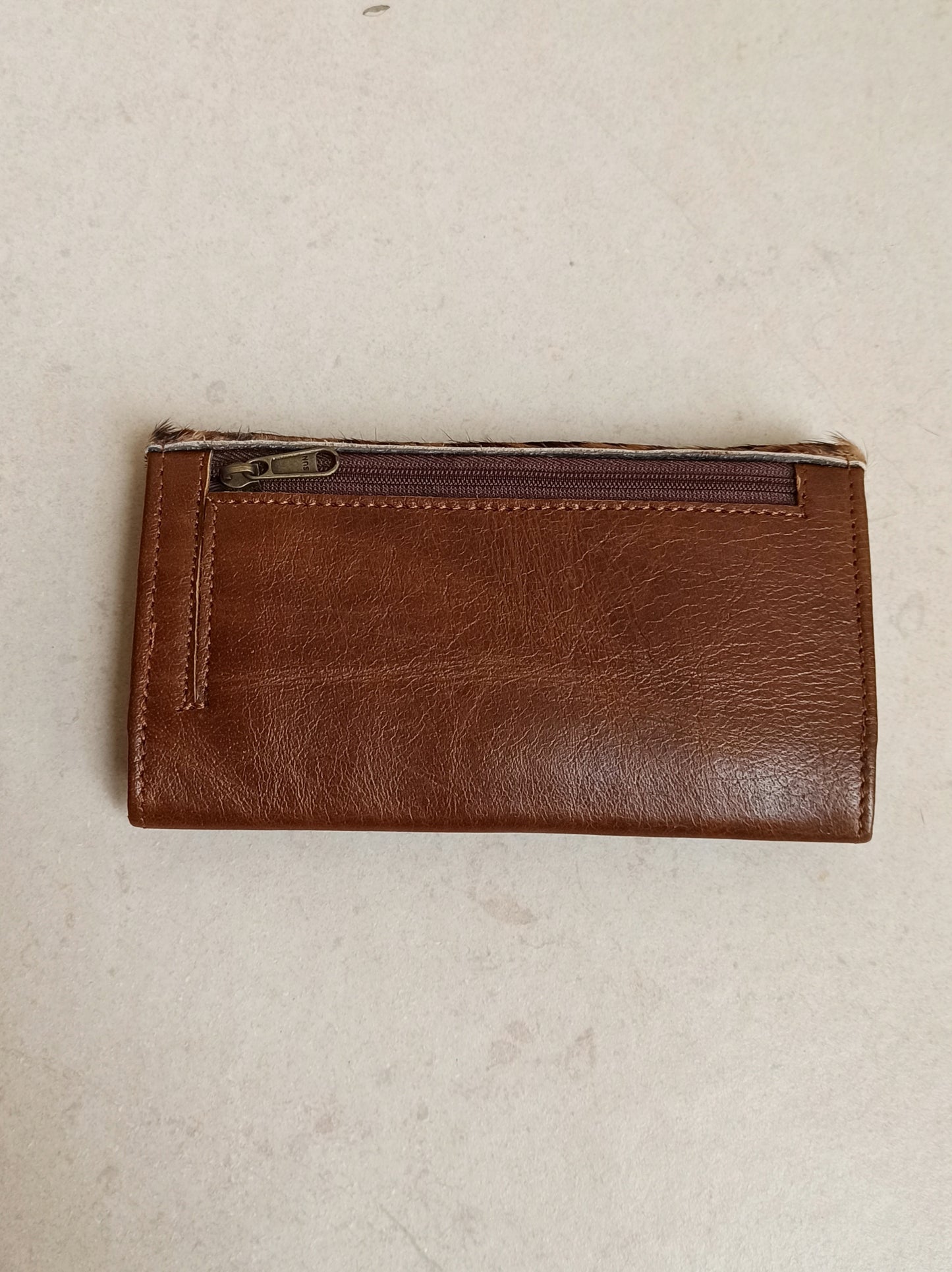 Brown spotted leather wallet