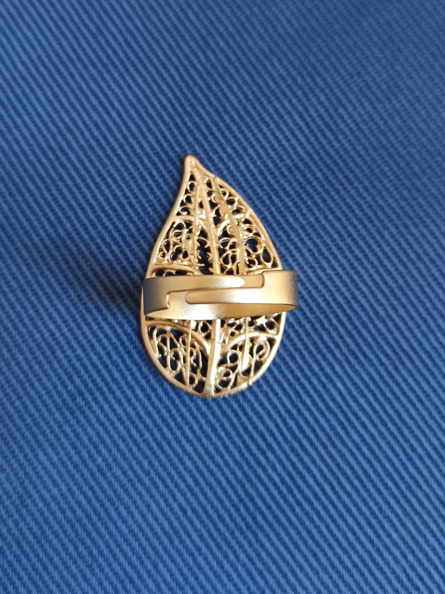 Golden perforated leaf ring