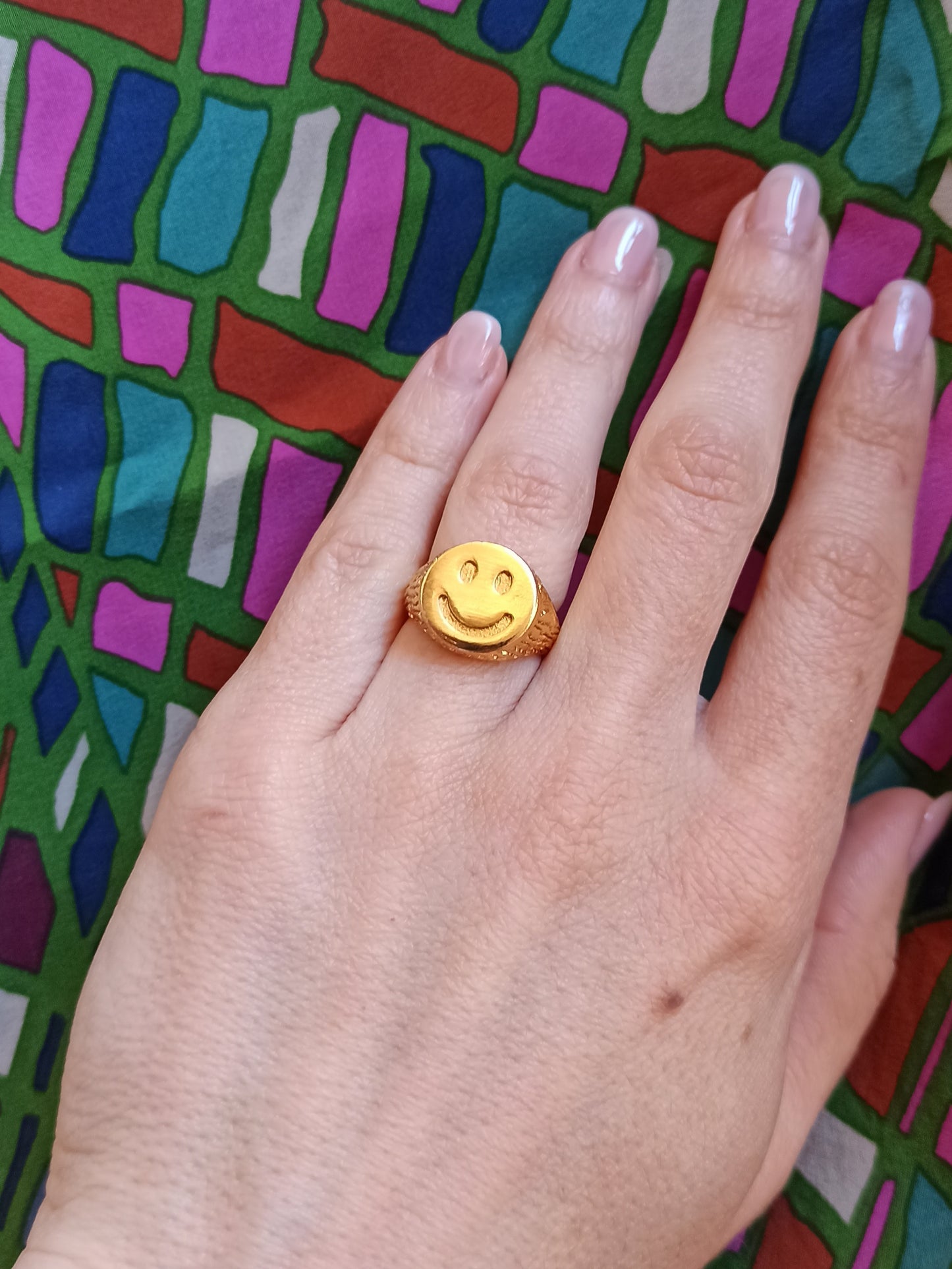 Golden smiley ring