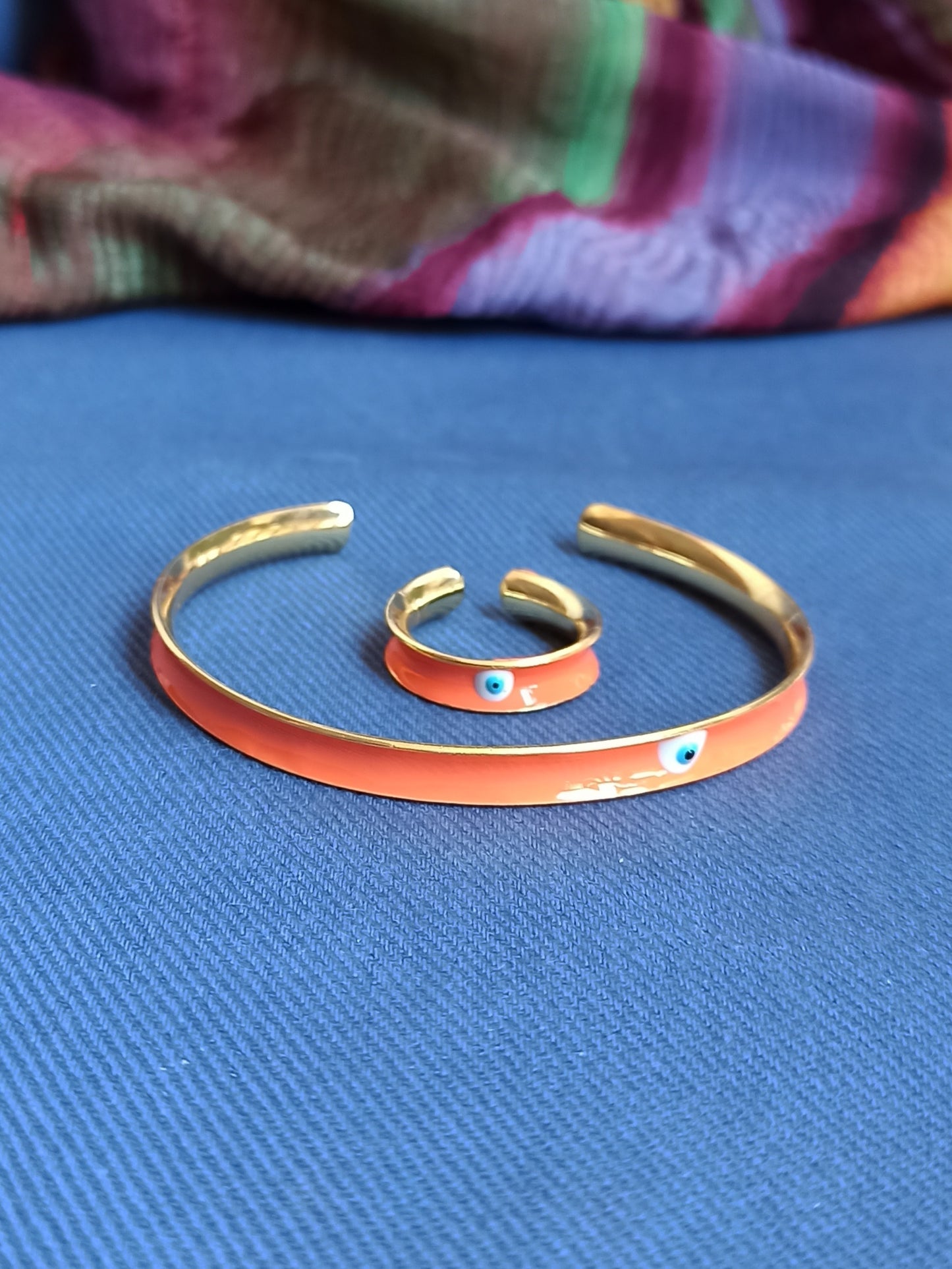 Orange eye bracelet and ring set