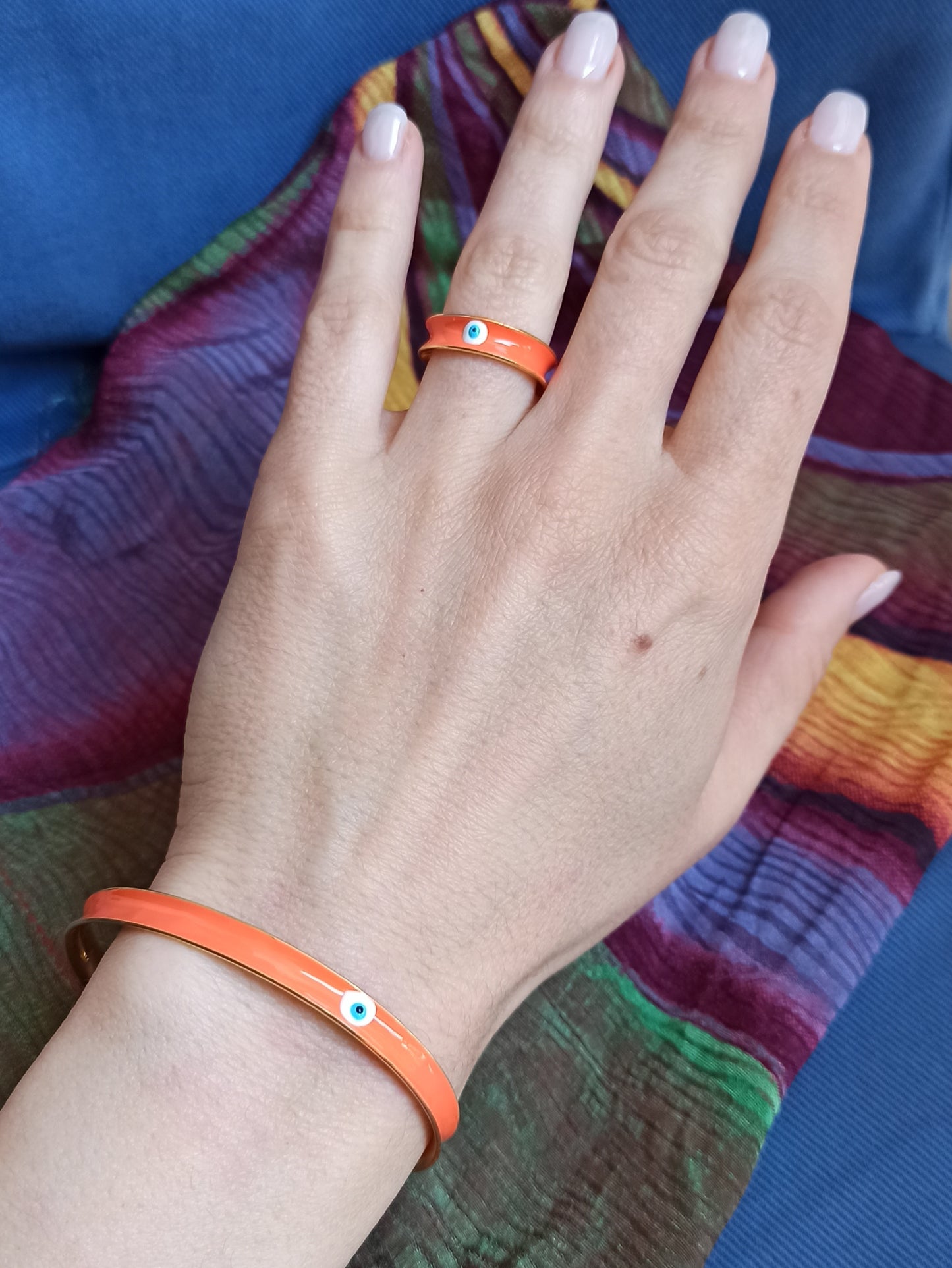 Orange eye bracelet and ring set