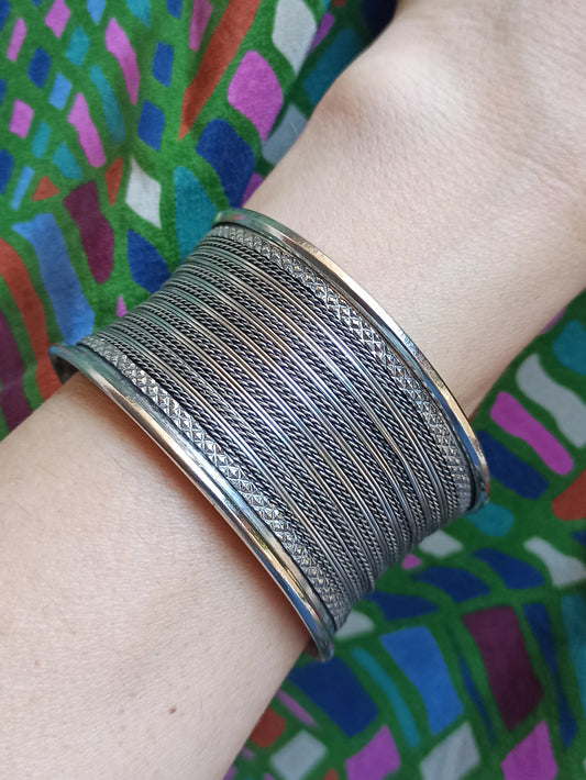 Multi-string silver bangle bracelet